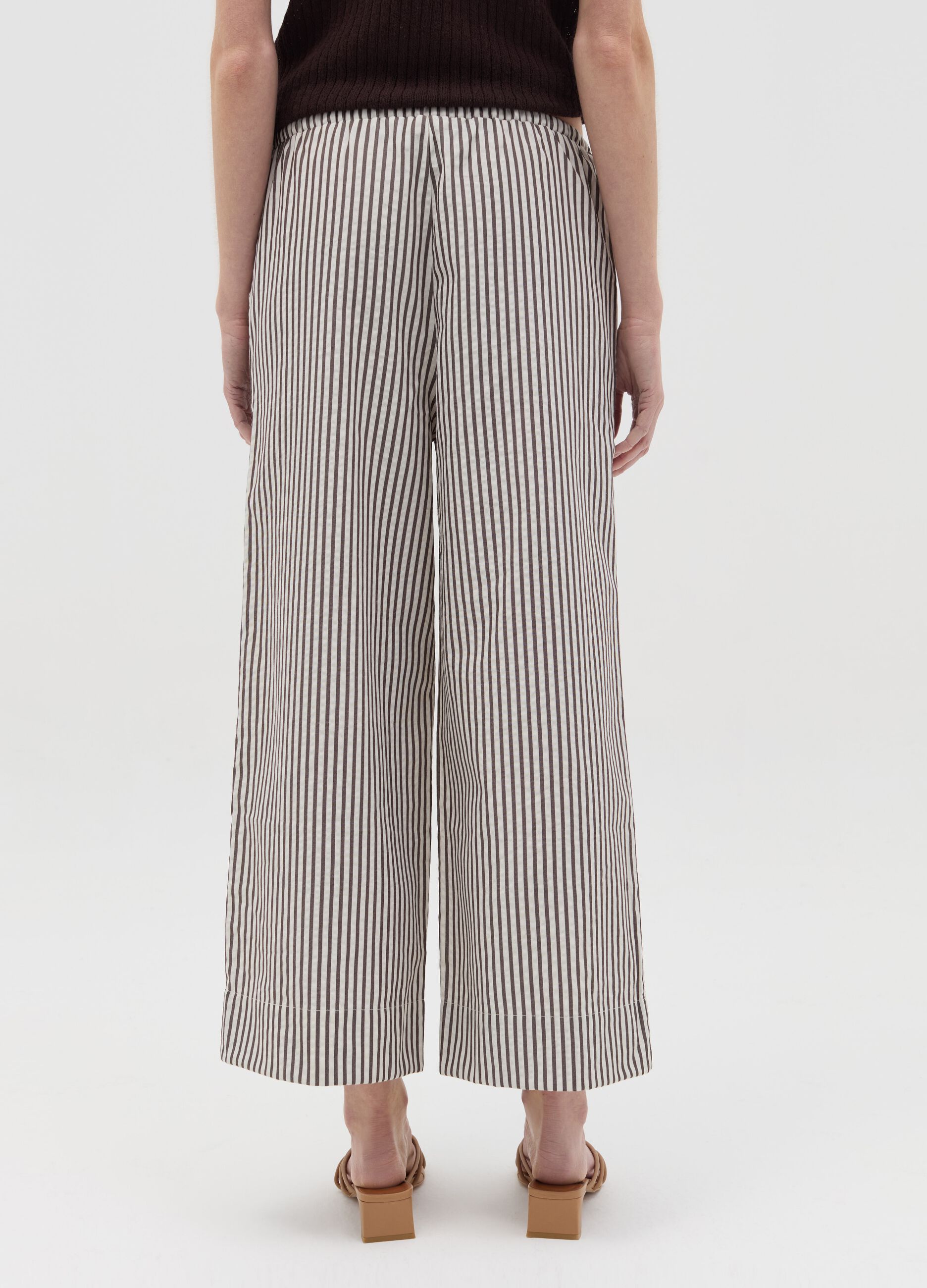 White and brown wide-leg trousers with stripes