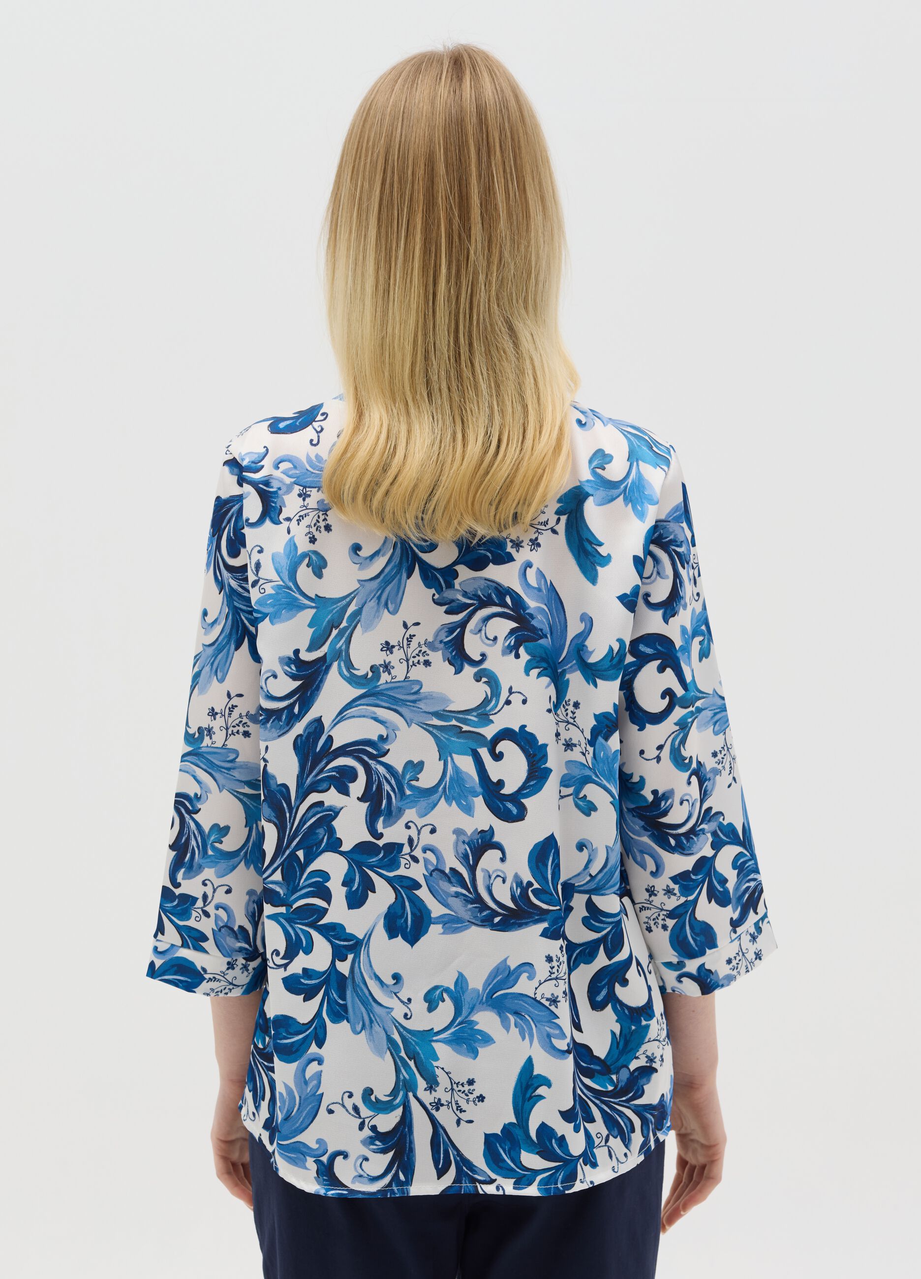 White and blue blouse with print