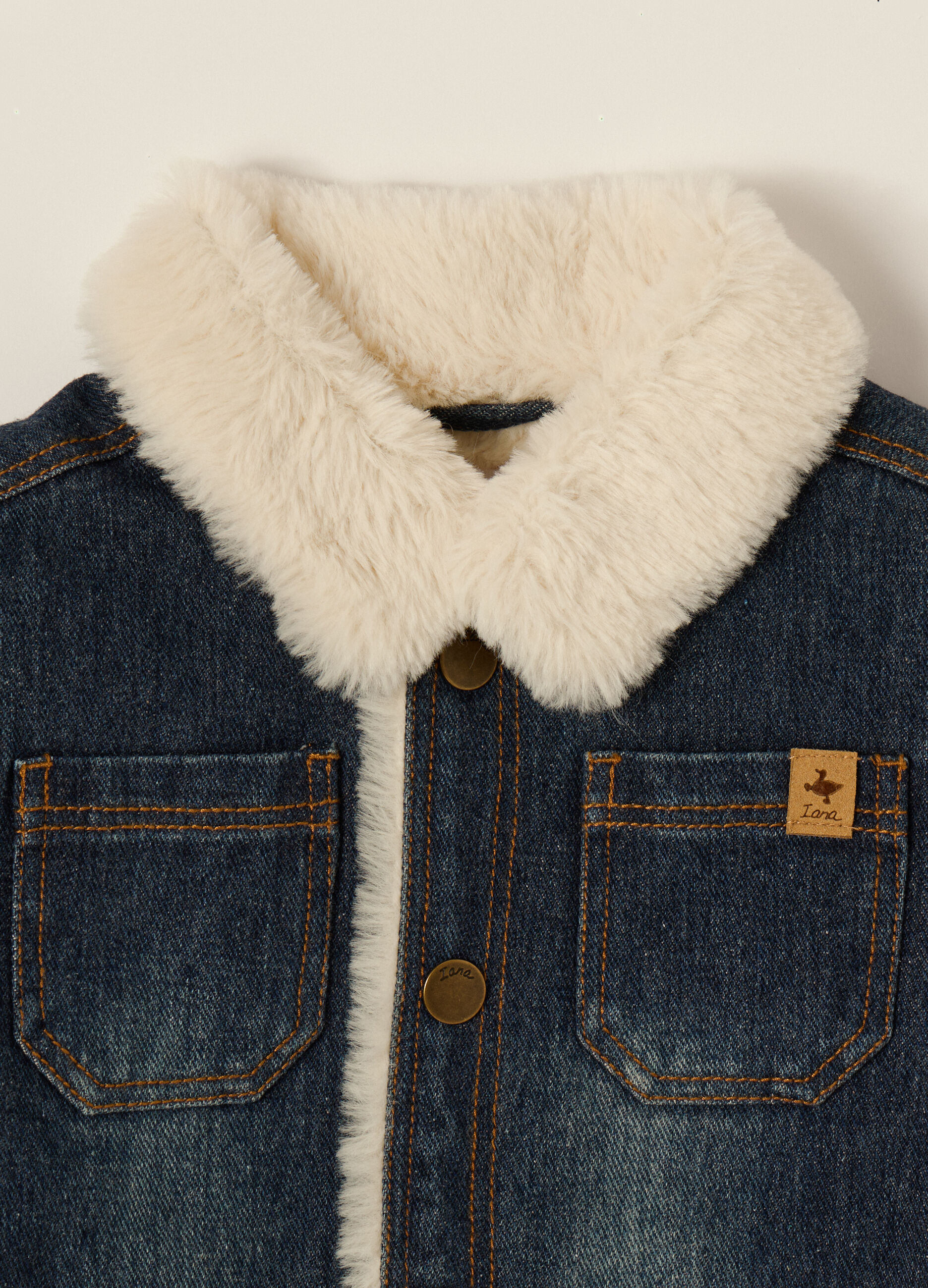 Blue denim jacket with fur lining