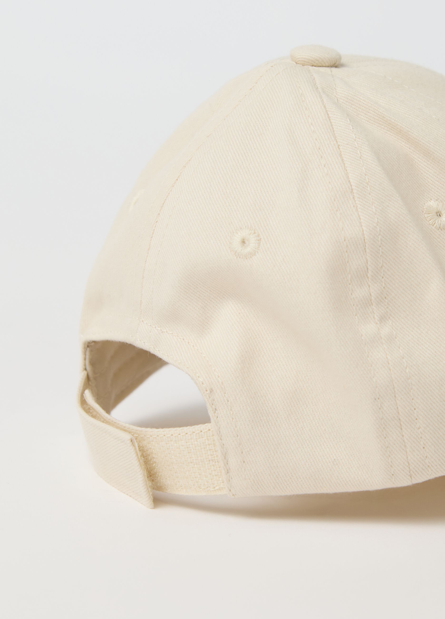 White baseball cap with embroidery