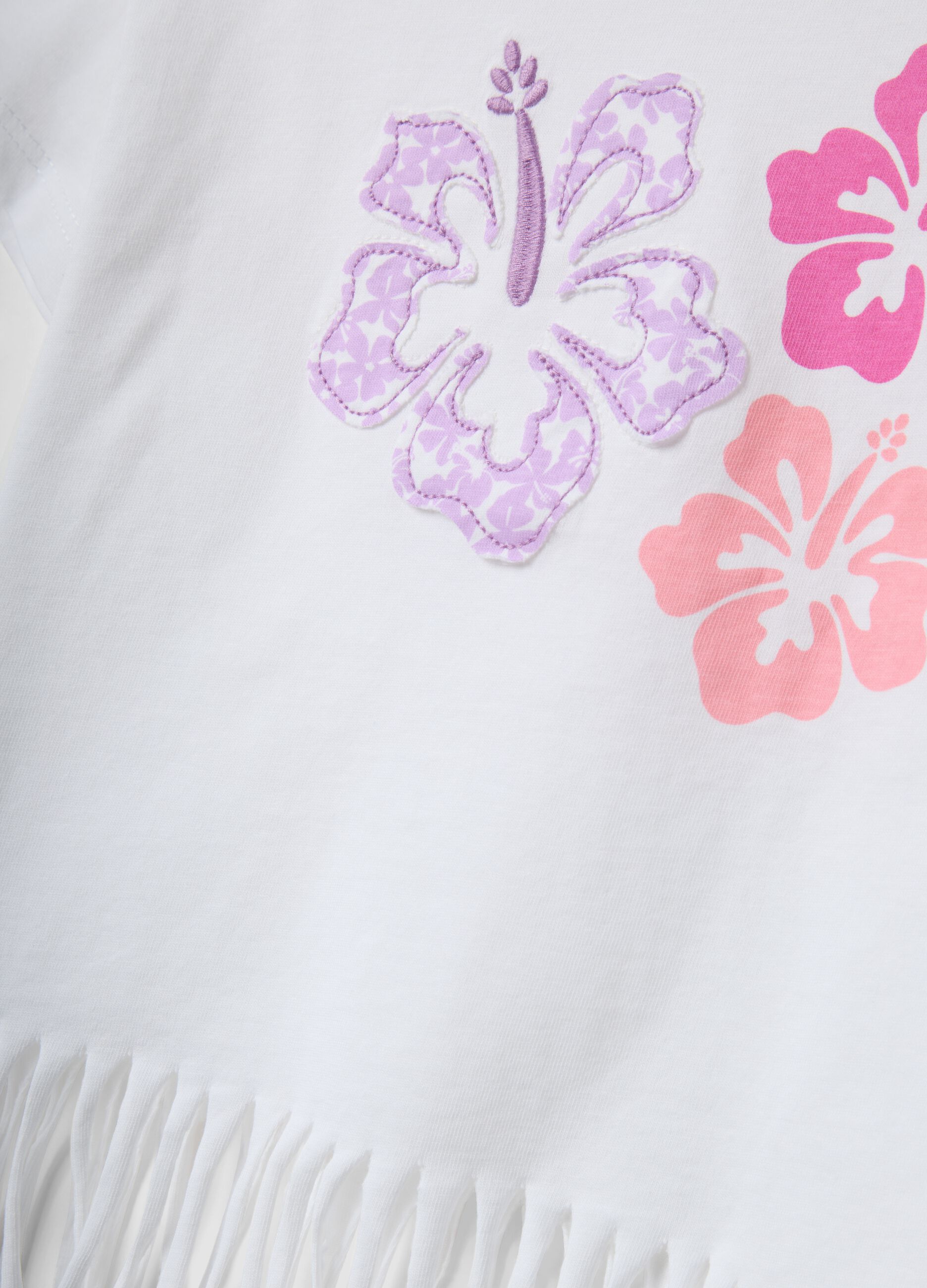 White pure cotton T-shirt with floral print and fringed hem