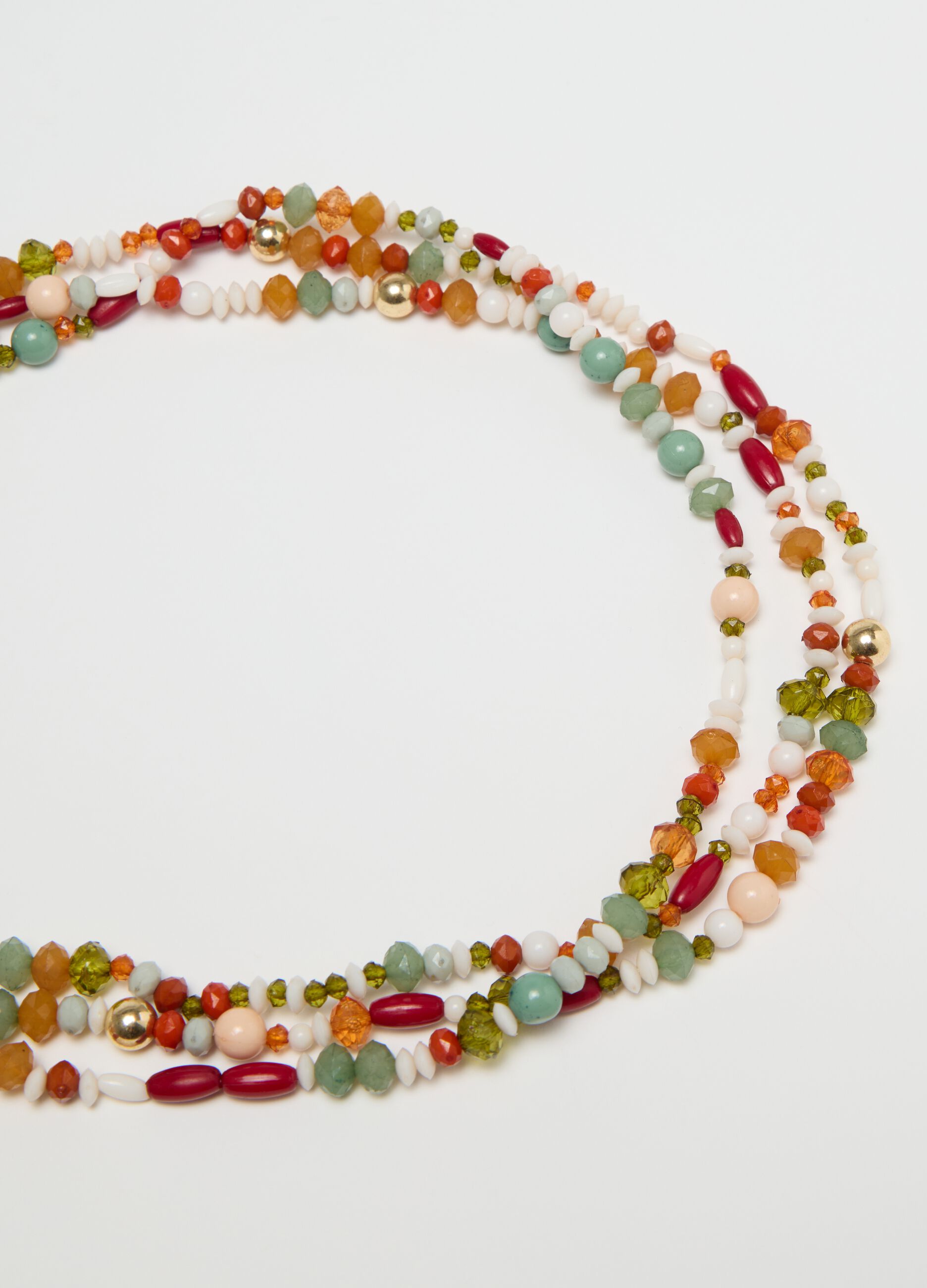 Long red and green necklace with stones