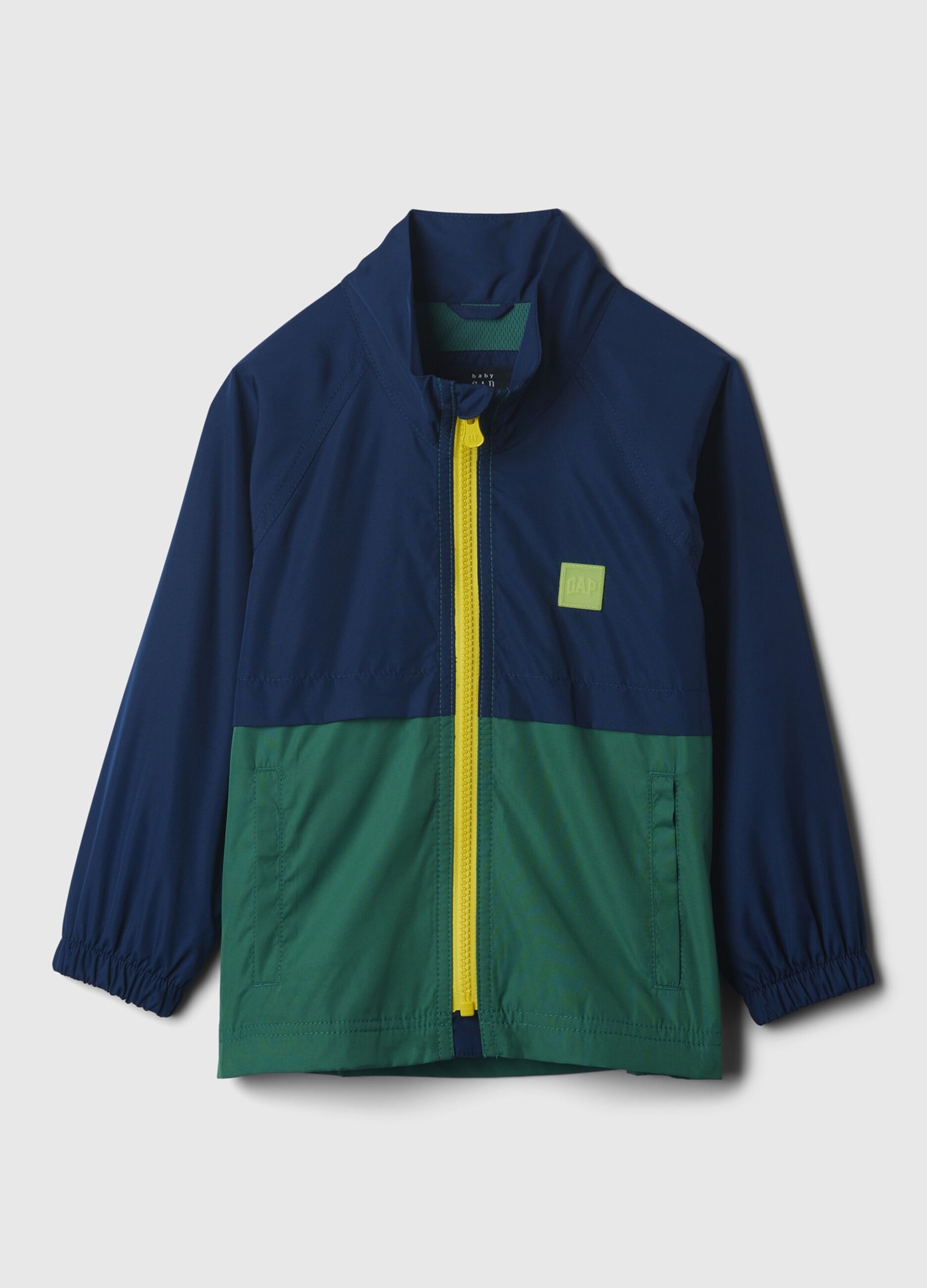 Two-tone windbreaker with logo patch