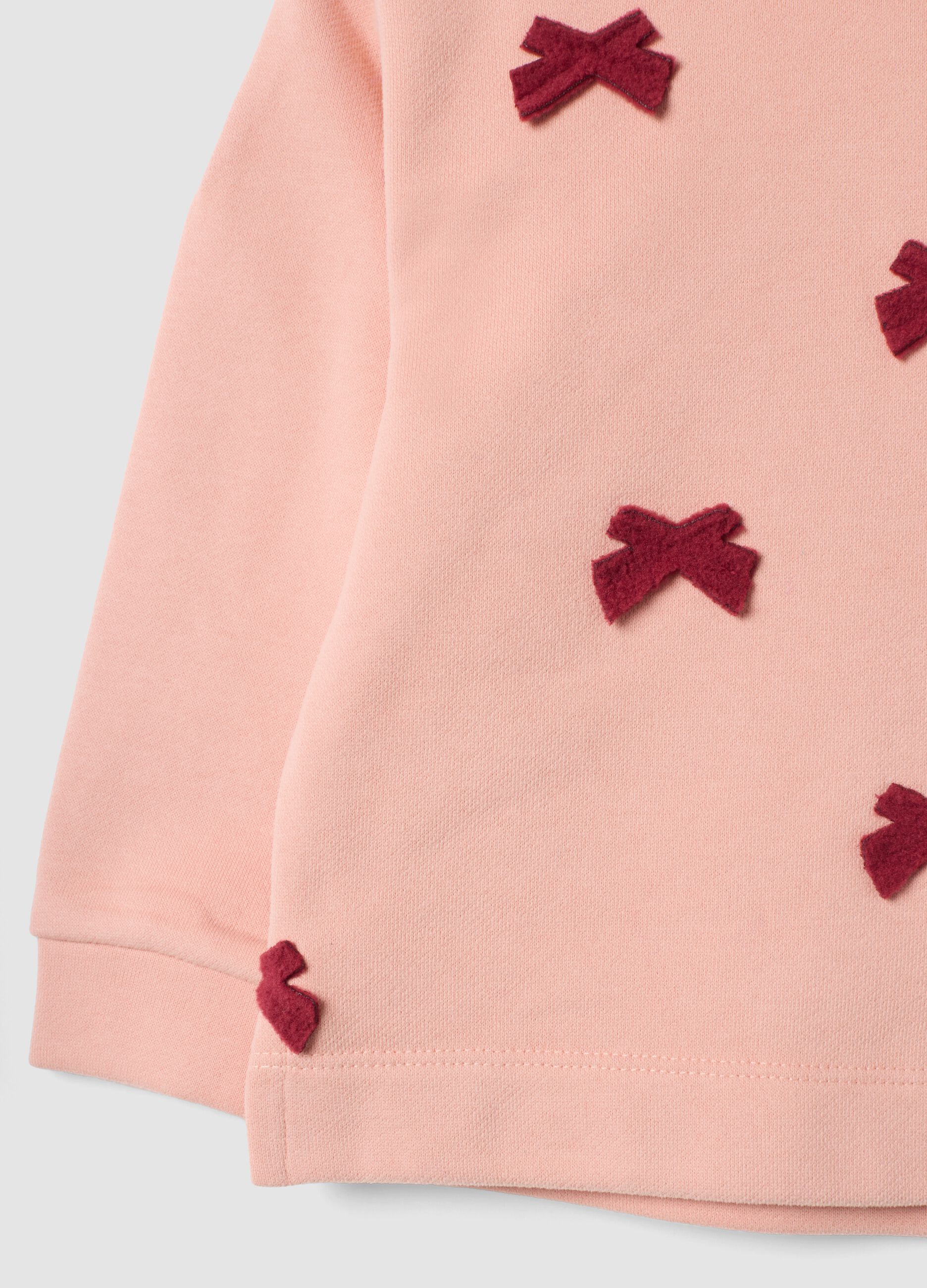 Felpa rosa chiaro in puro cotone con fiocchi e girocollo