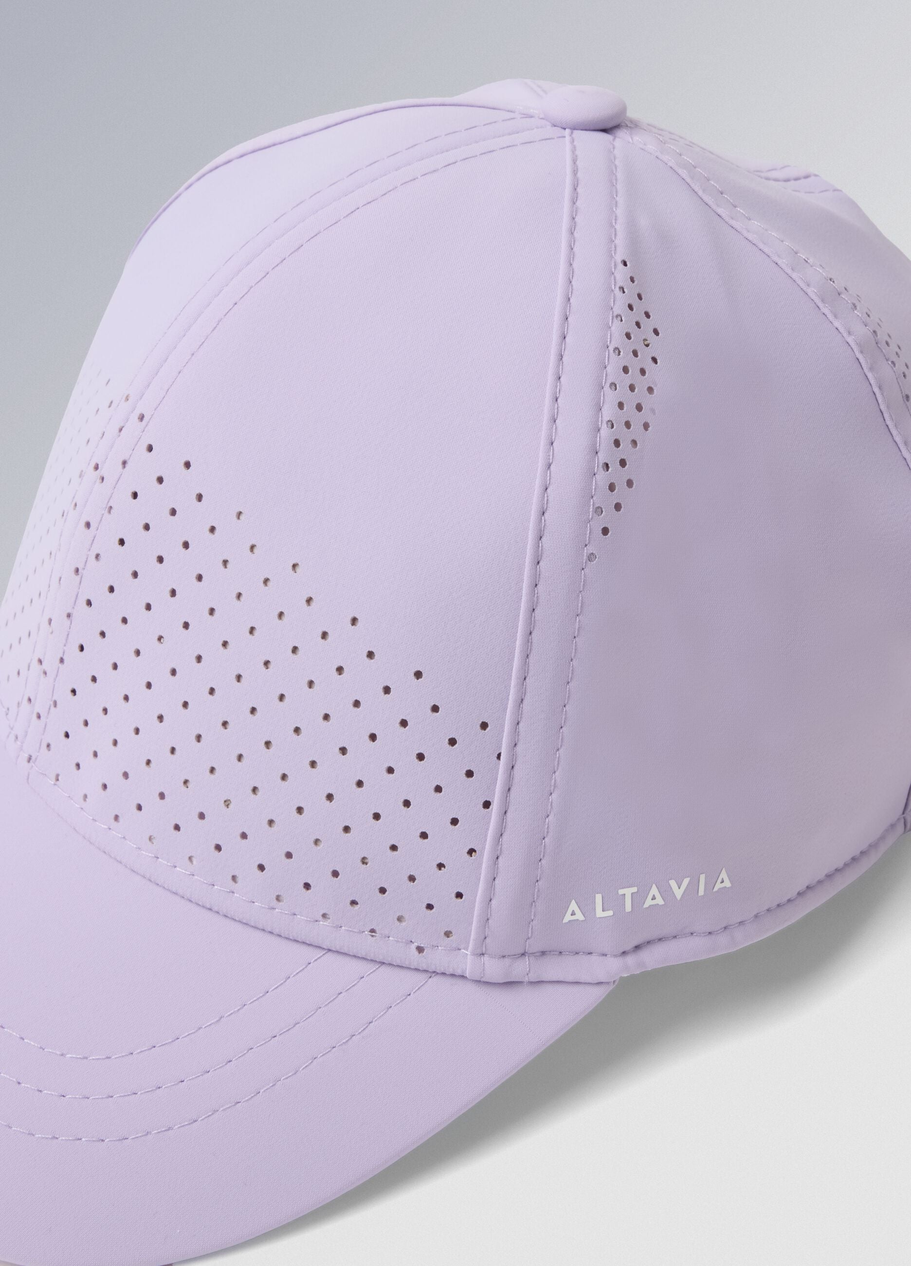 Cappellino sportivo viola in tessuto elasticizzato con visiera ALTAVIA COURT