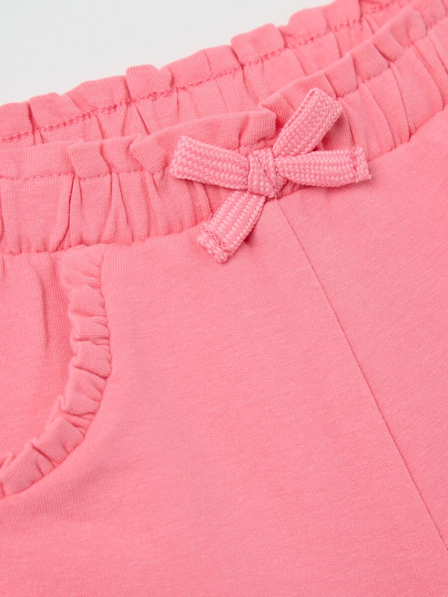 Pink French terry shorts with bow and frills_2
