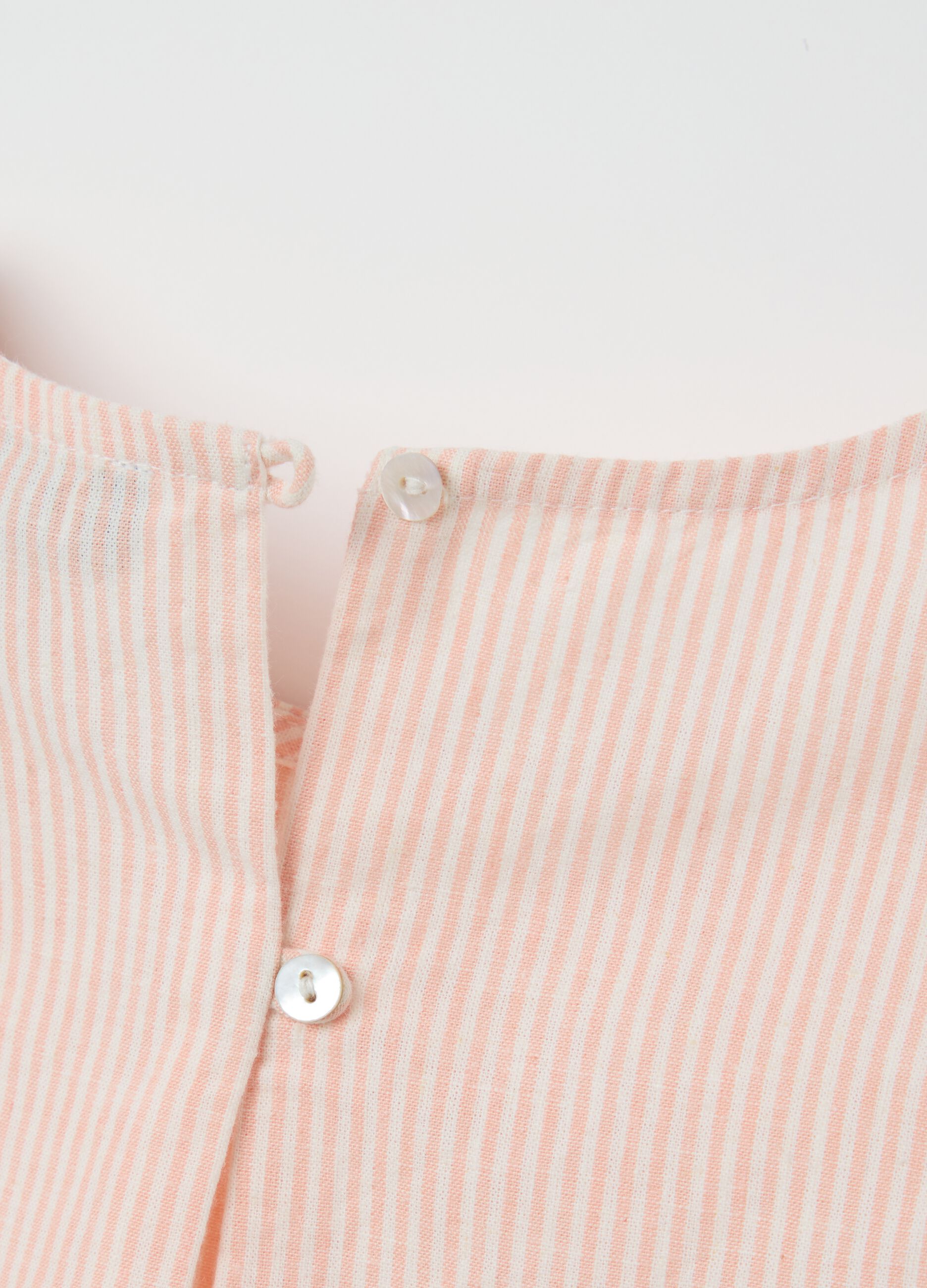 Sleeveless pink striped blouse in cotton and linen