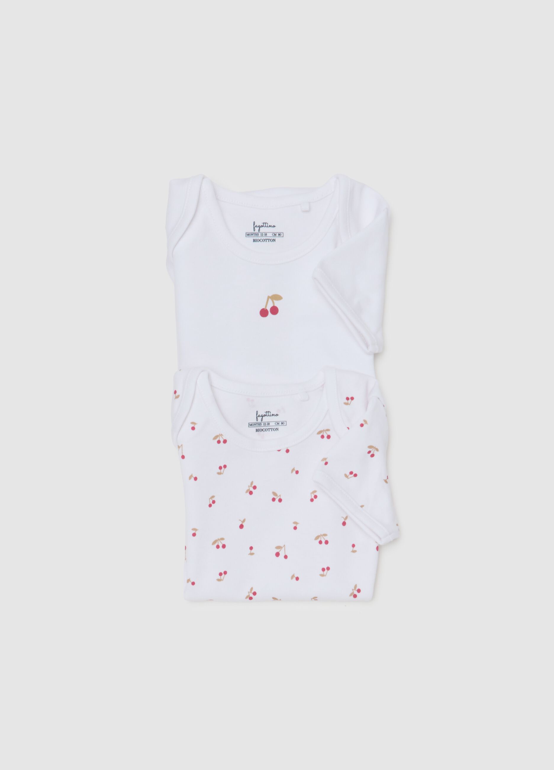 Set of two white pure cotton bodysuits for baby girls