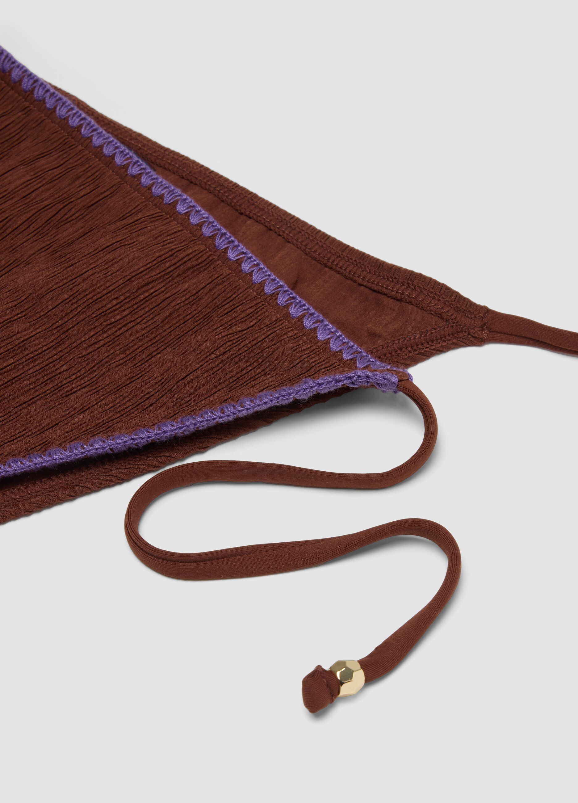 Brown triangle bikini bottoms in stretch fabric with purple trim