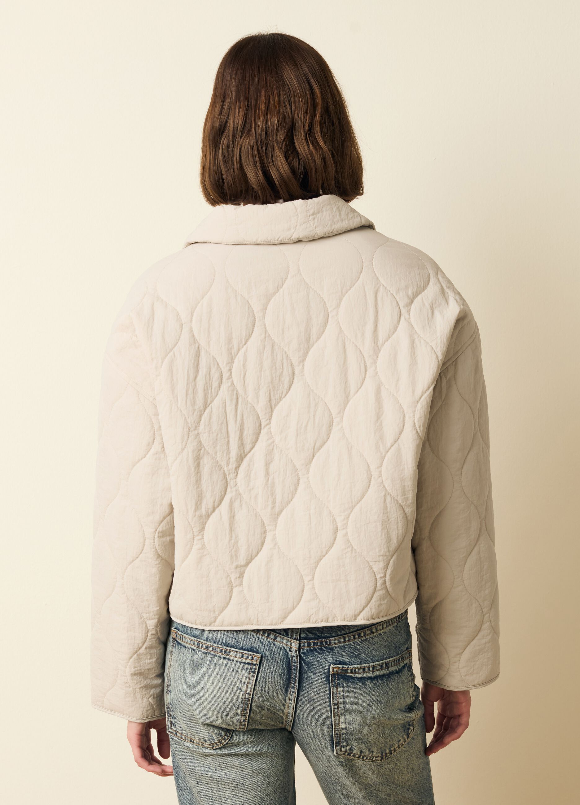 Short quilted jacket with buttons