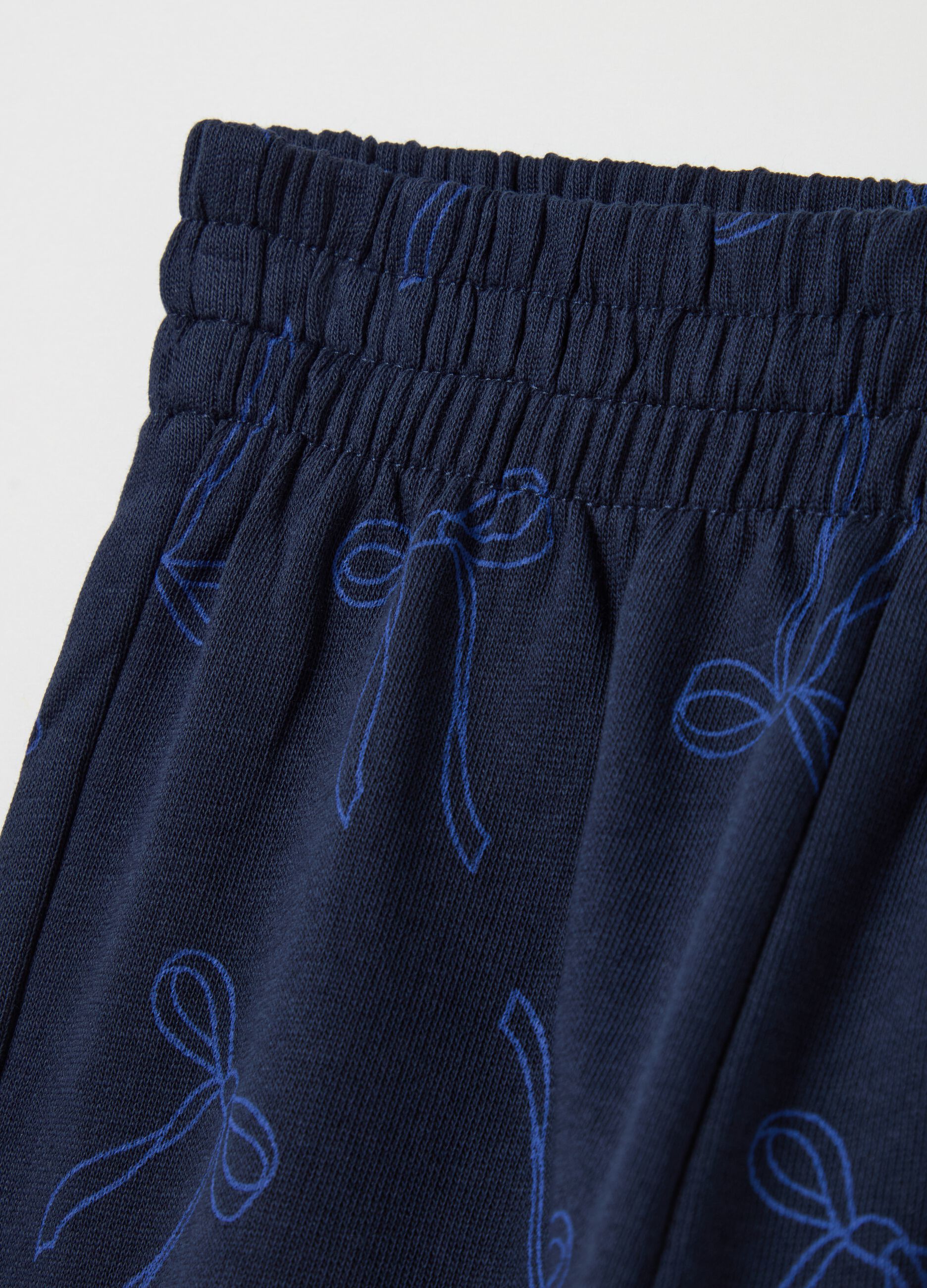 Cotton joggers with elasticated trims and print