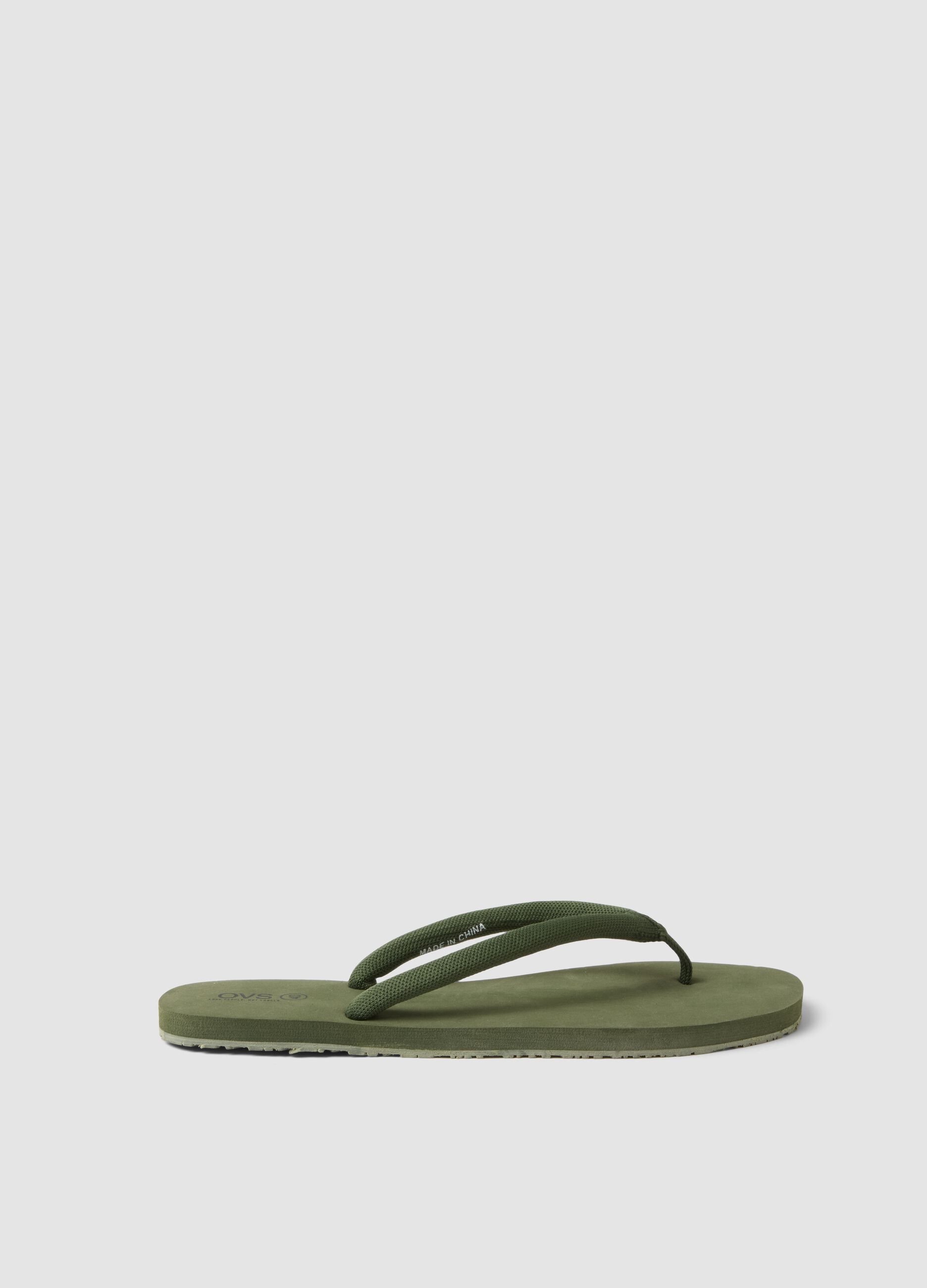 Green flip-flops with thick straps