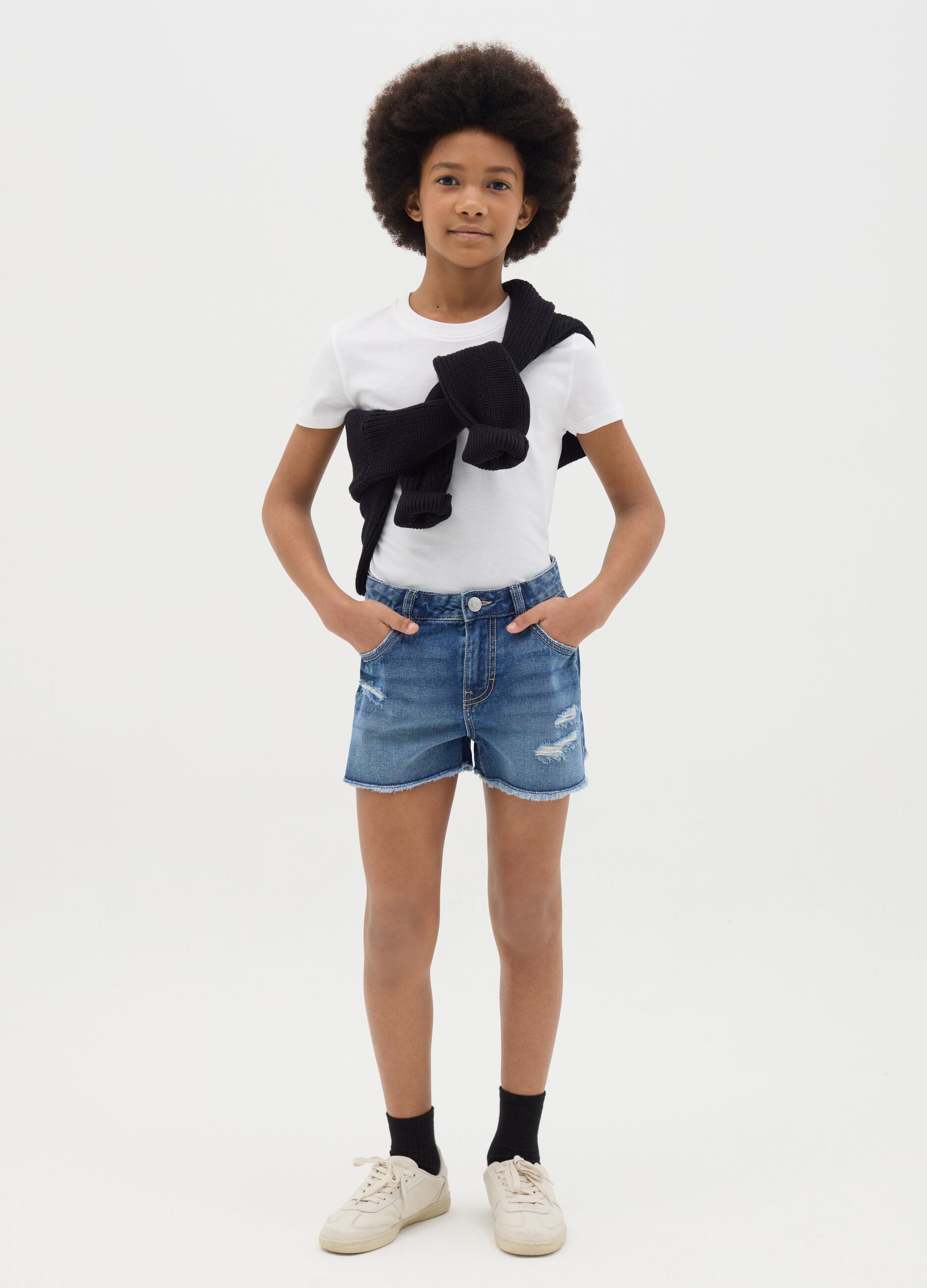 Denim shorts with five pockets and abrasions
