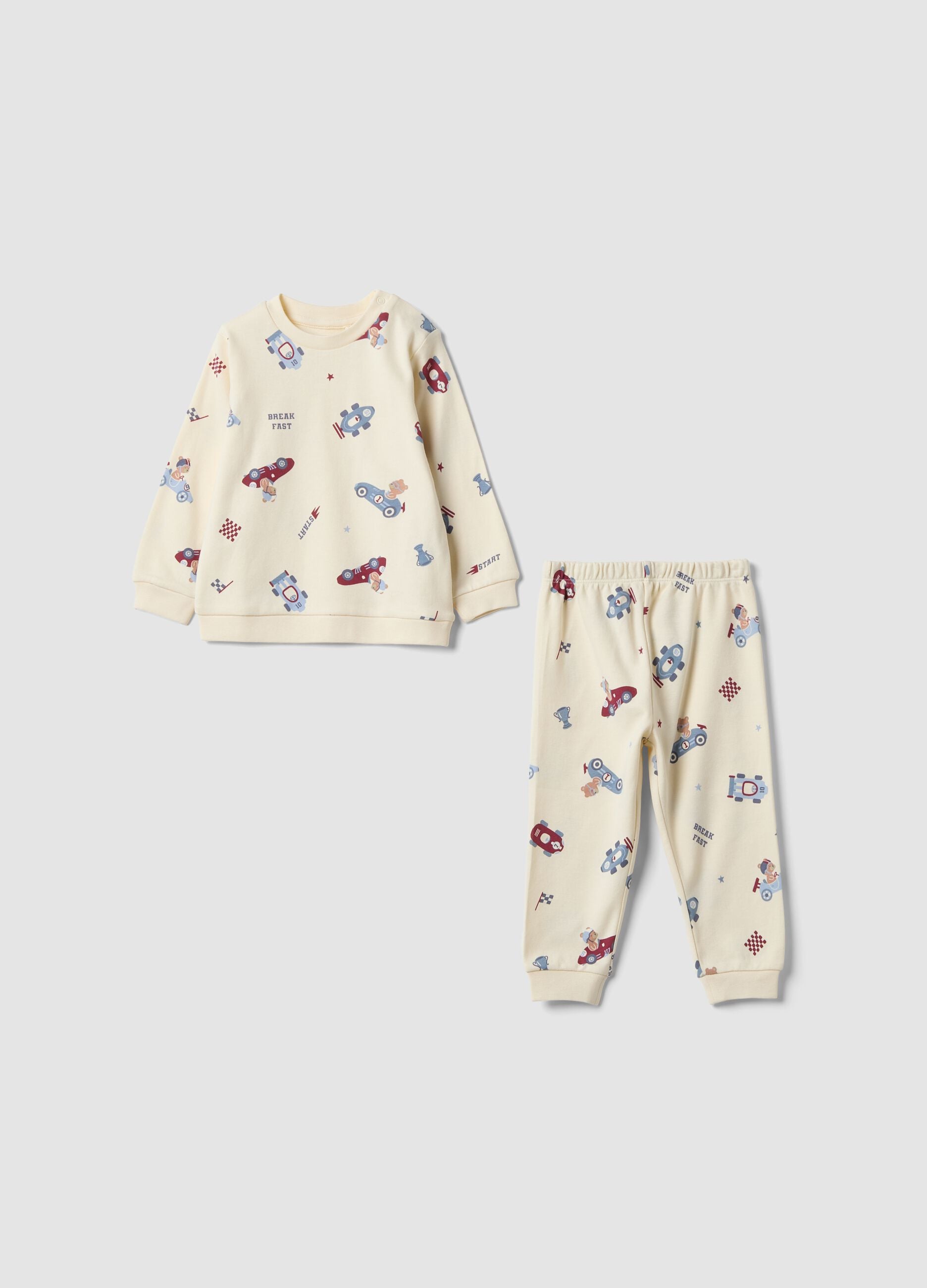White organic cotton baby pyjamas with car print