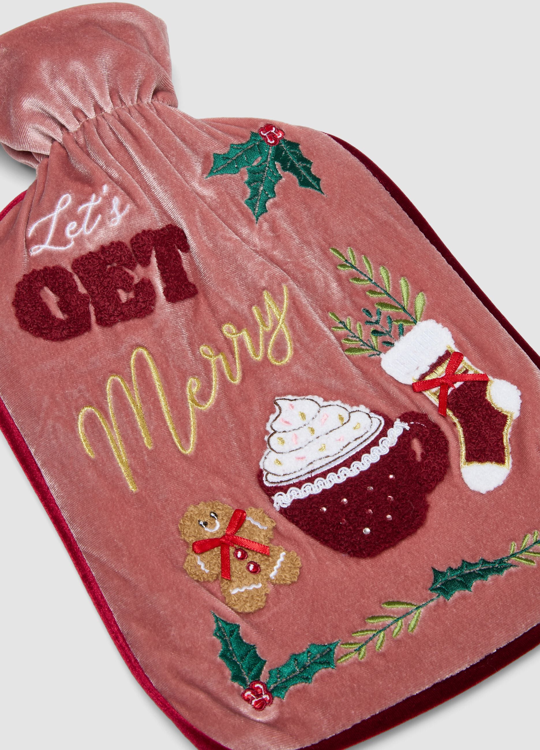 Pink hot water bottle with festive embroidery