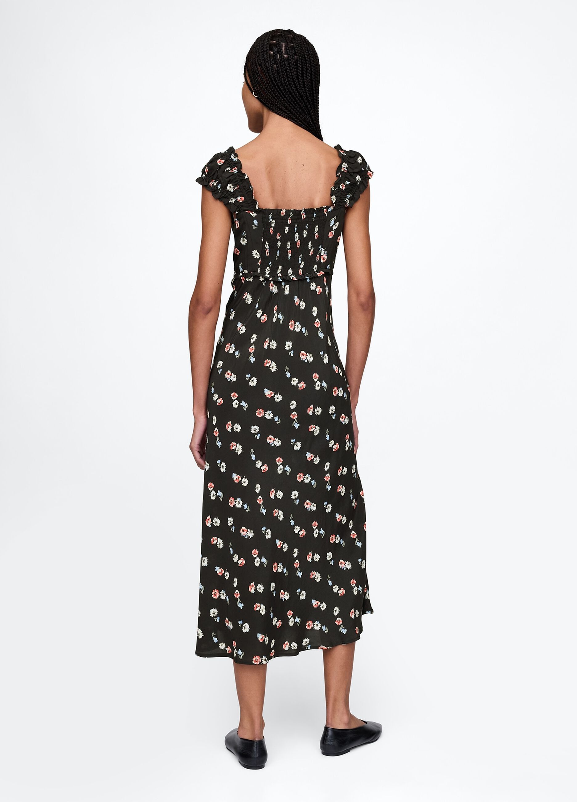 Sleeveless dress with floral pattern