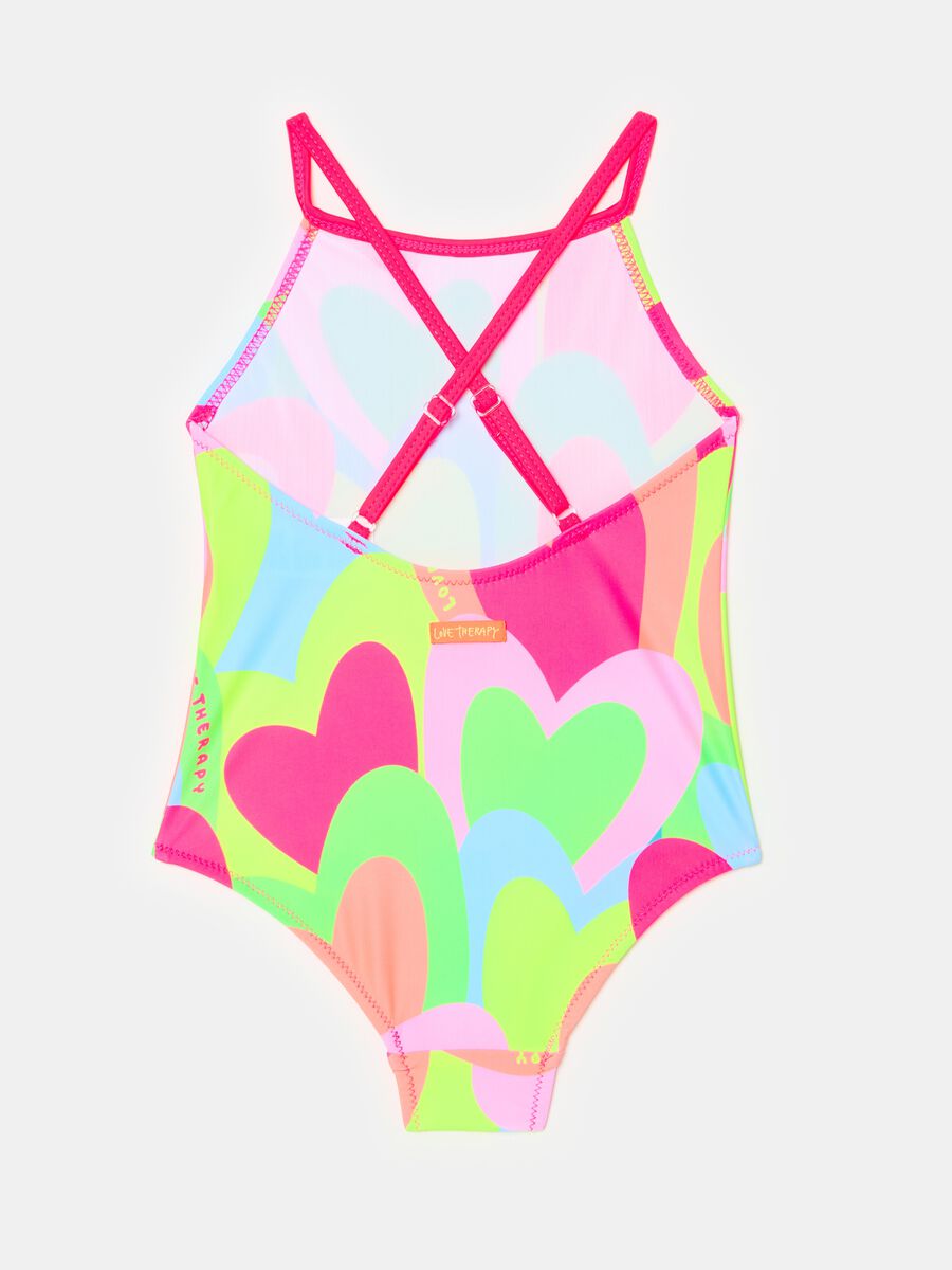 One-piece swimsuit with multicoloured hearts print_1