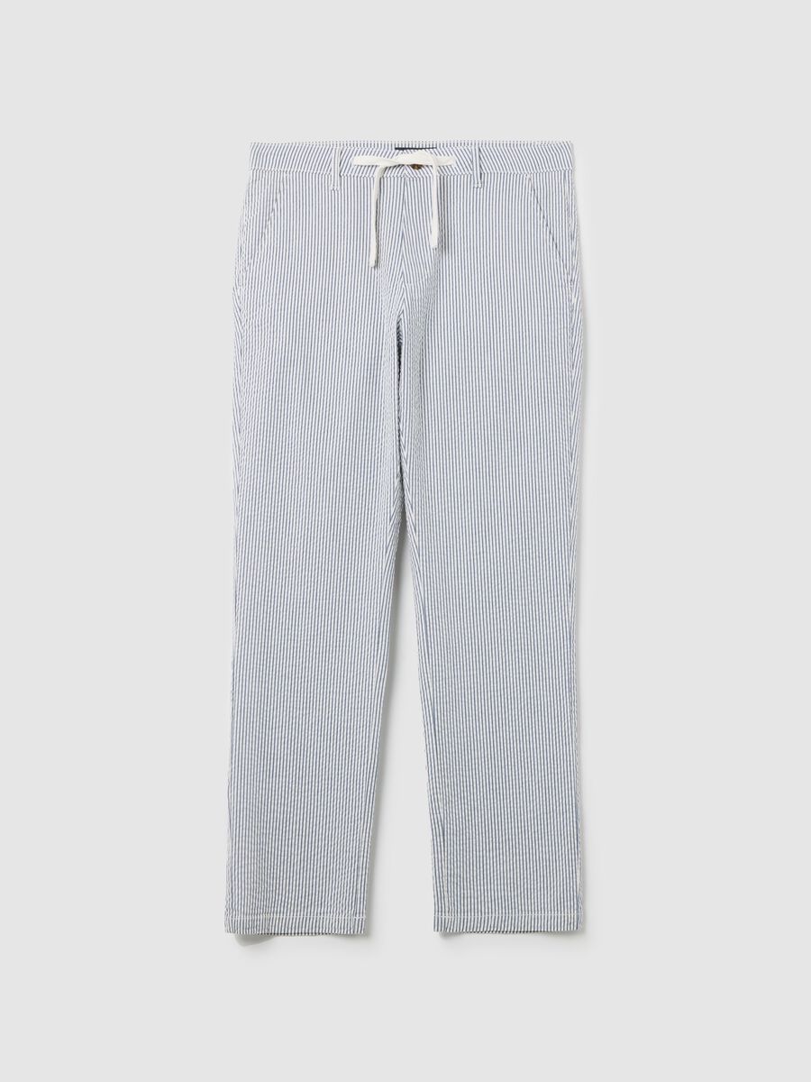 Seersucker chino trousers with white and blue stripes_4