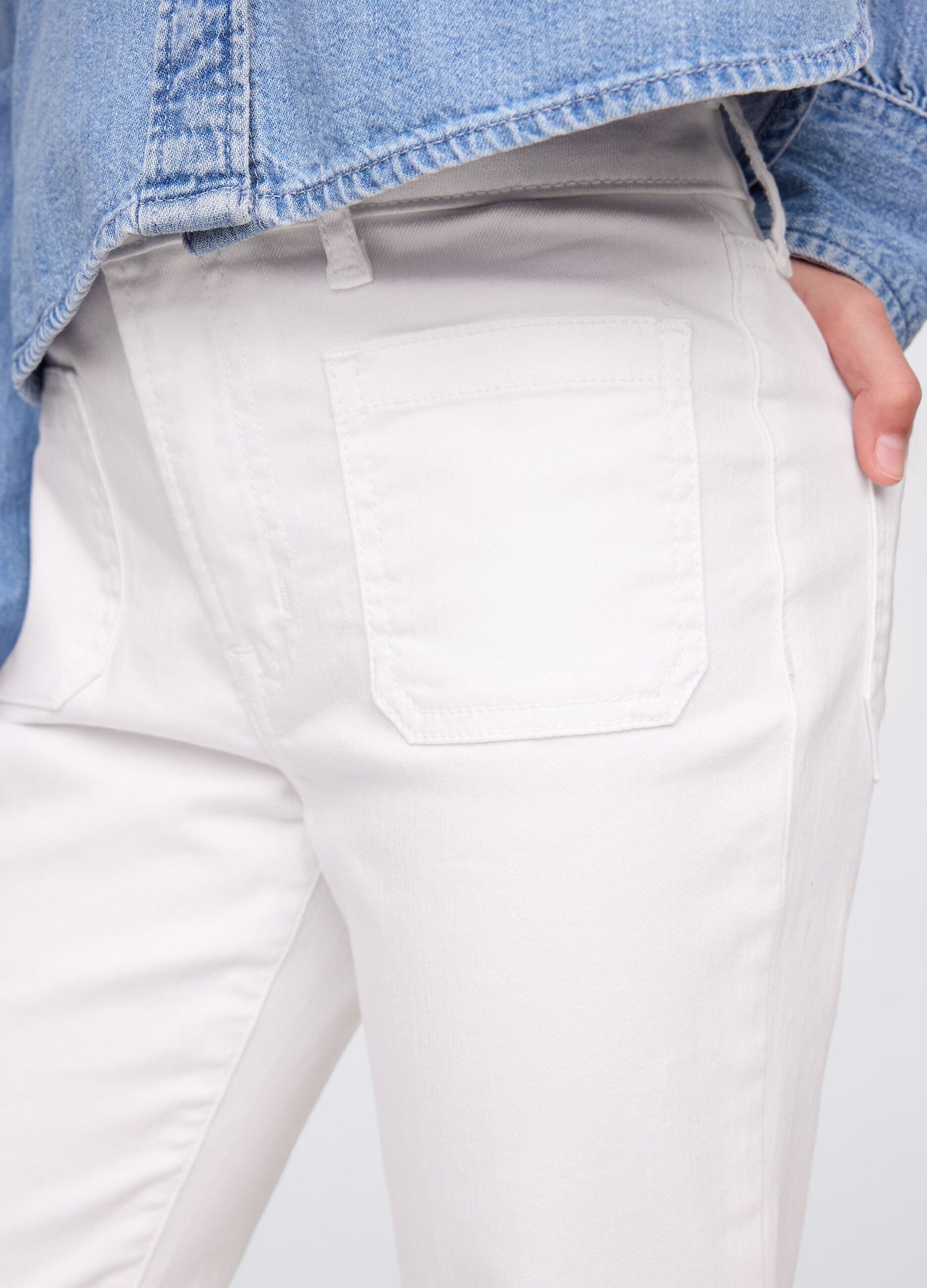 White flared jeans