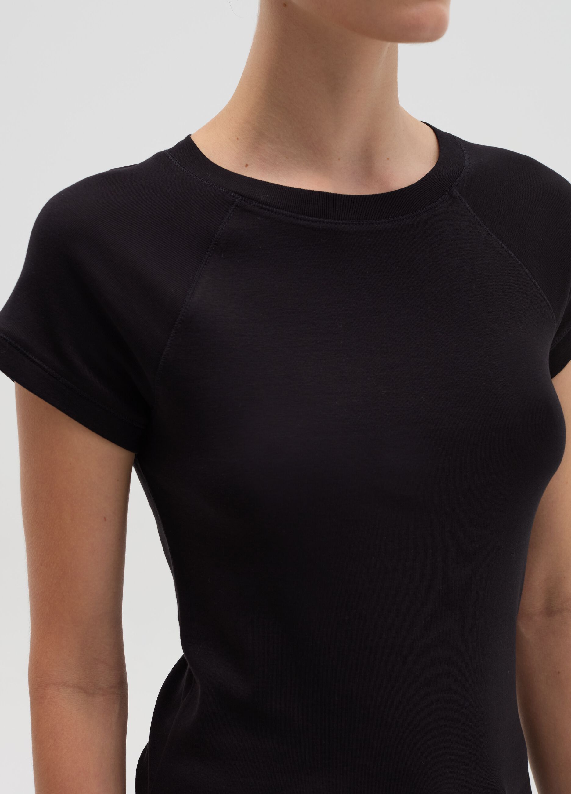 T-shirt con maniche raglan