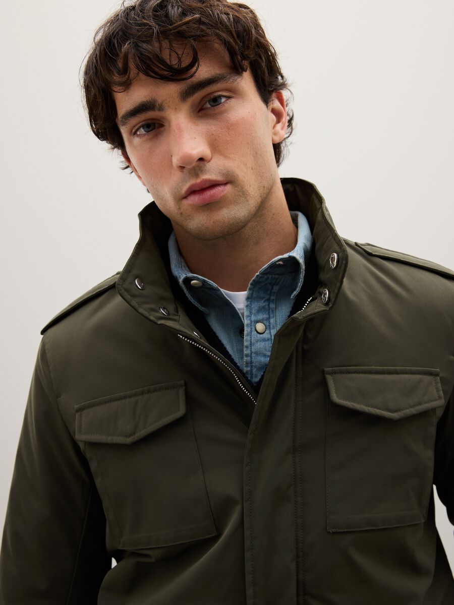 Regular fit green jacket with pockets and zip closure_1