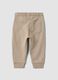 Pantaloni jogger beige in puro cotone con stampa cagnolino per bimbo_1