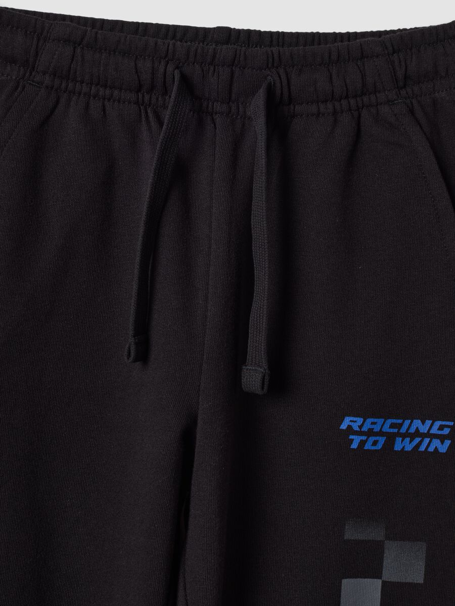 Pantaloni jogger neri in puro cotone con stampa a scacchi_2
