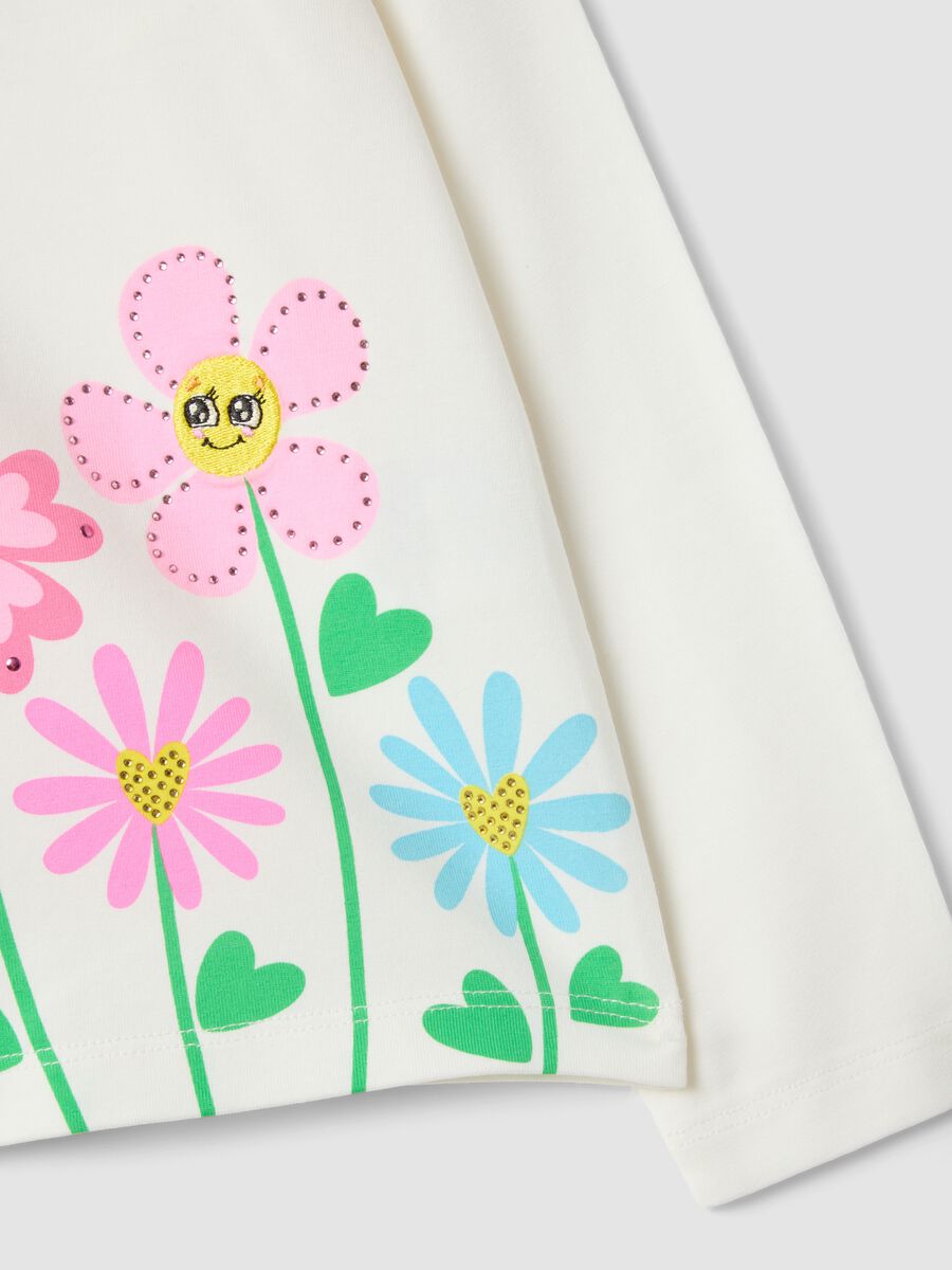 T-shirt bianca in cotone elasticizzato con fiori per bambina_3
