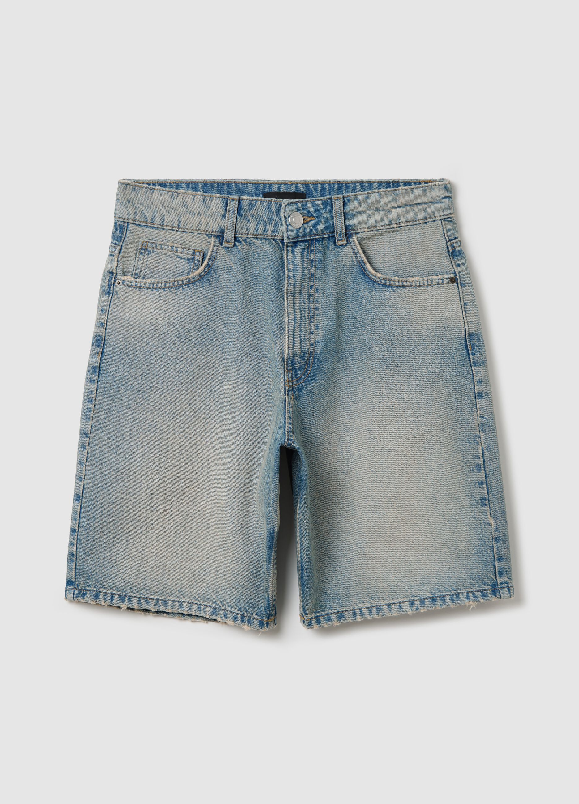 Light blue denim shorts with ripped details