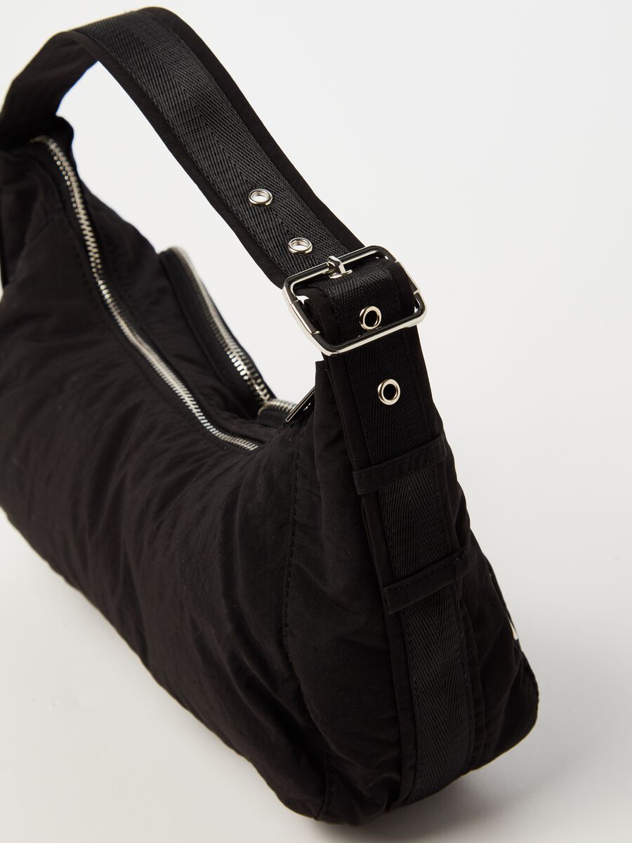 Shoulder bag with external pockets_1
