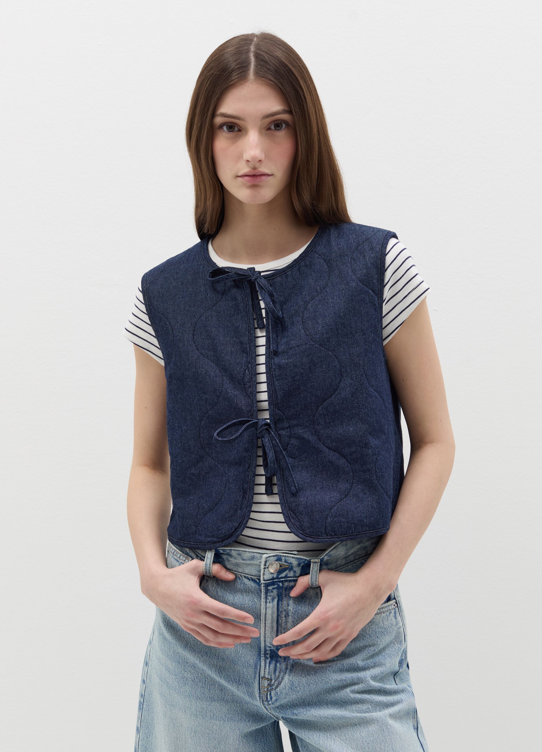 Padded gilet in denim with laces