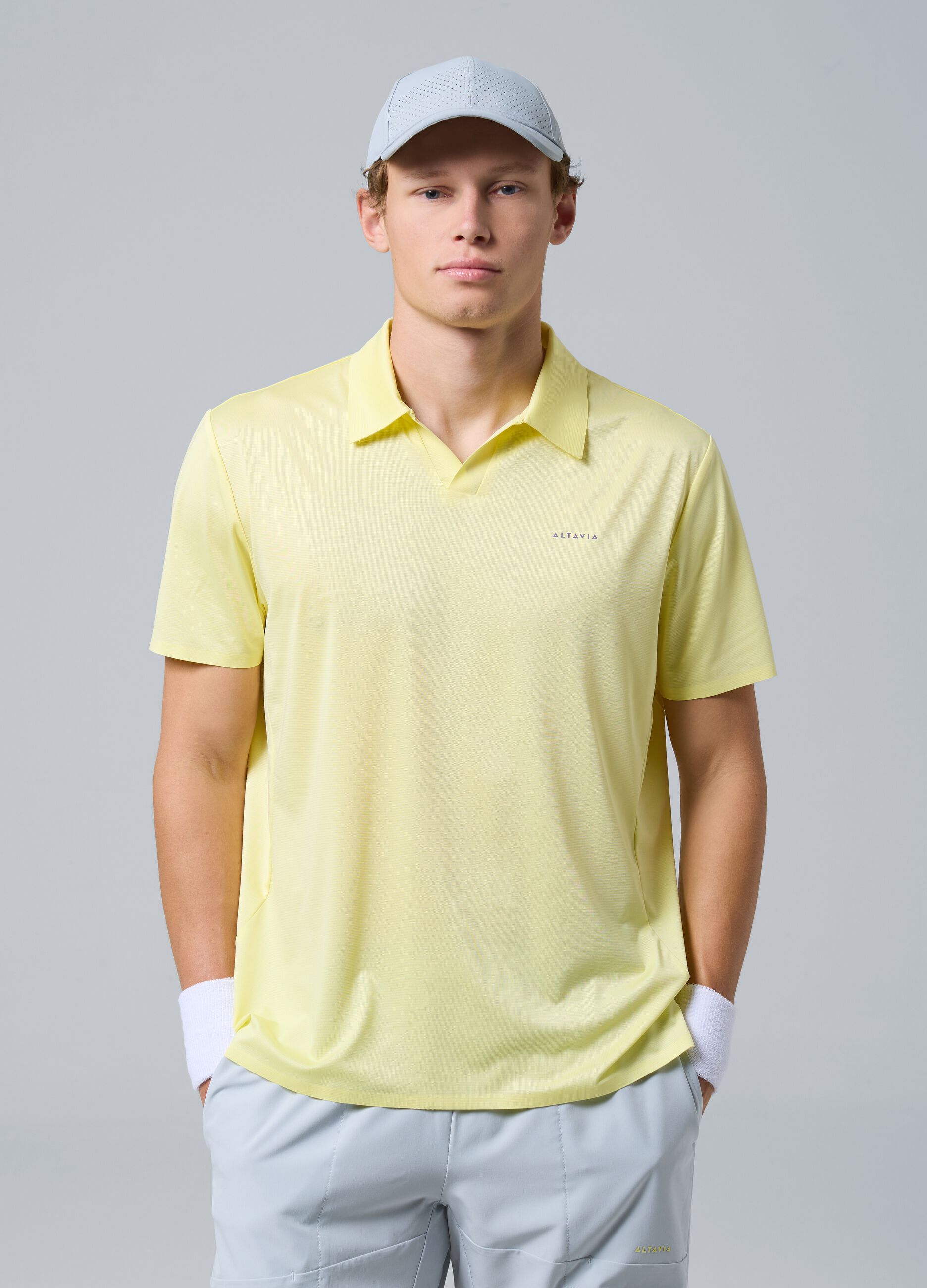 Yellow ALTAVIA COURT stretch performance polo