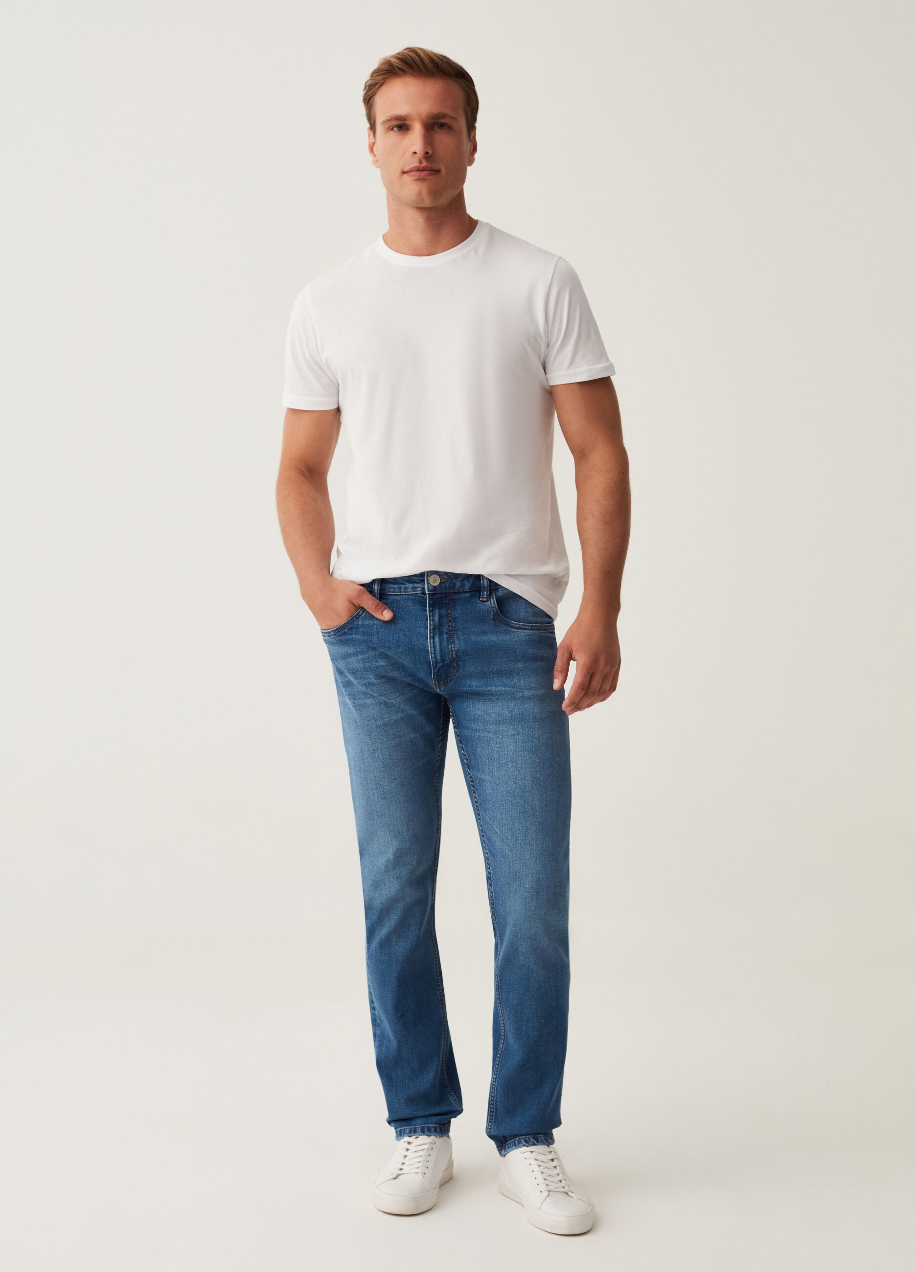 Jeans slim fit con scoloriture_0