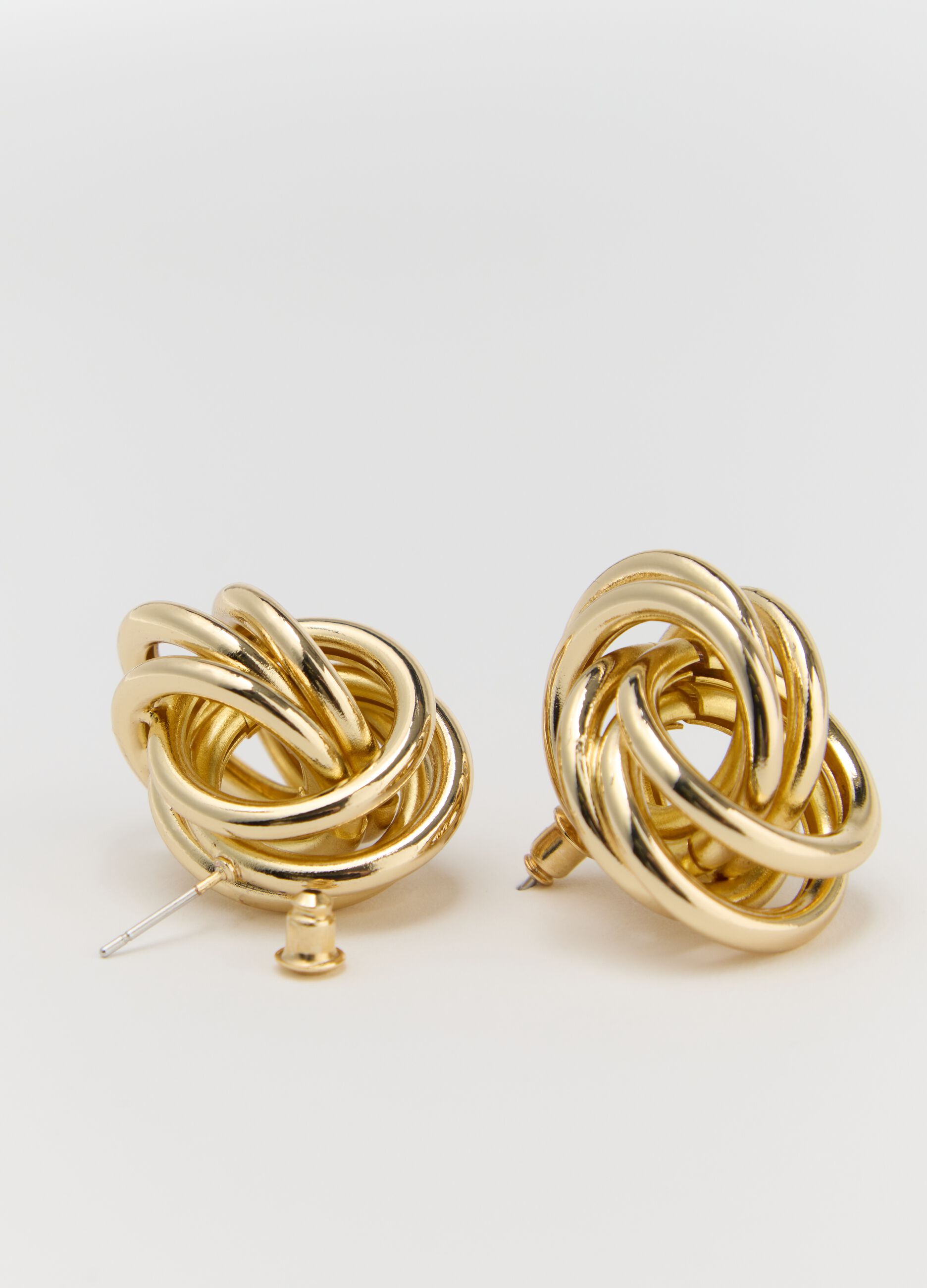 Orecchini a forma di nodo oro
