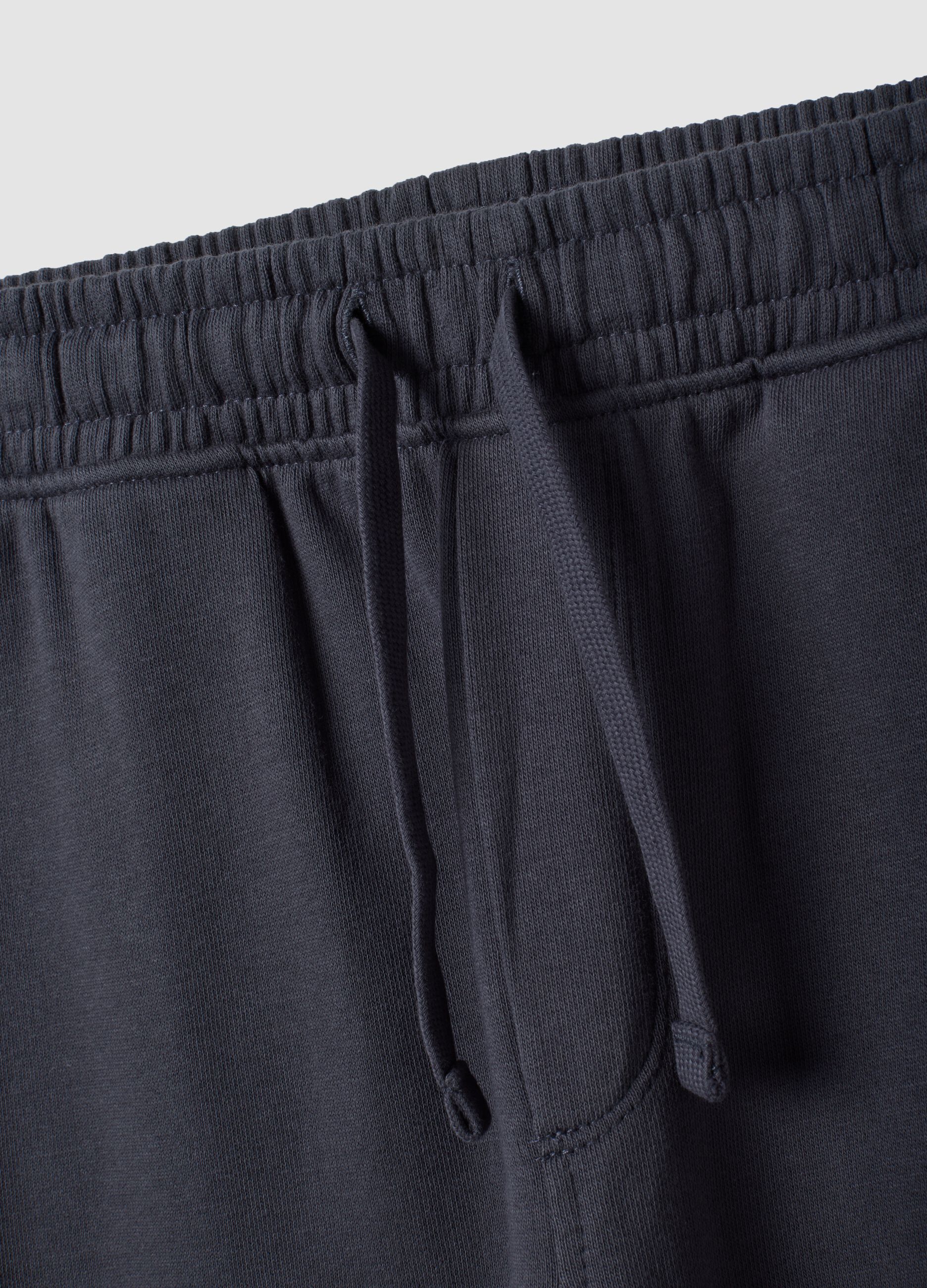Pantaloni jogger grigi in puro cotone organico con tasche cargo per bambino