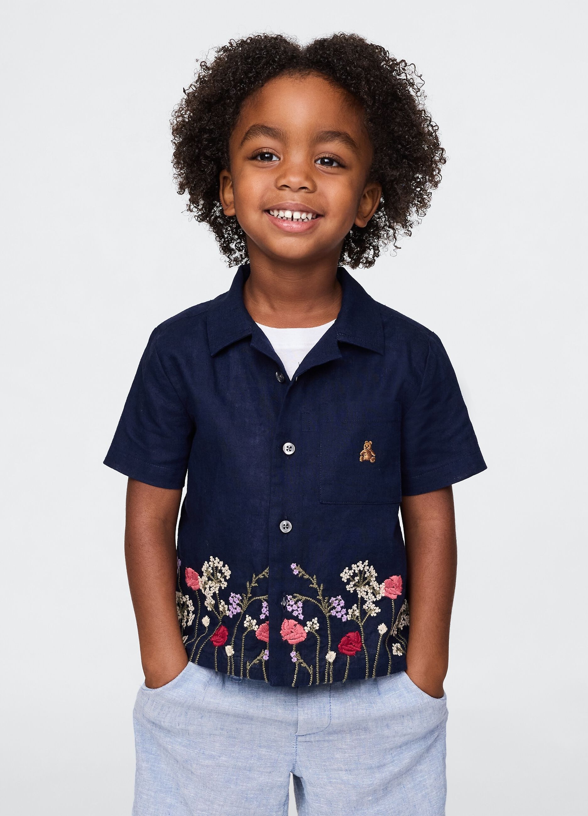 Navy blue short sleeve shirt with floral embroidery