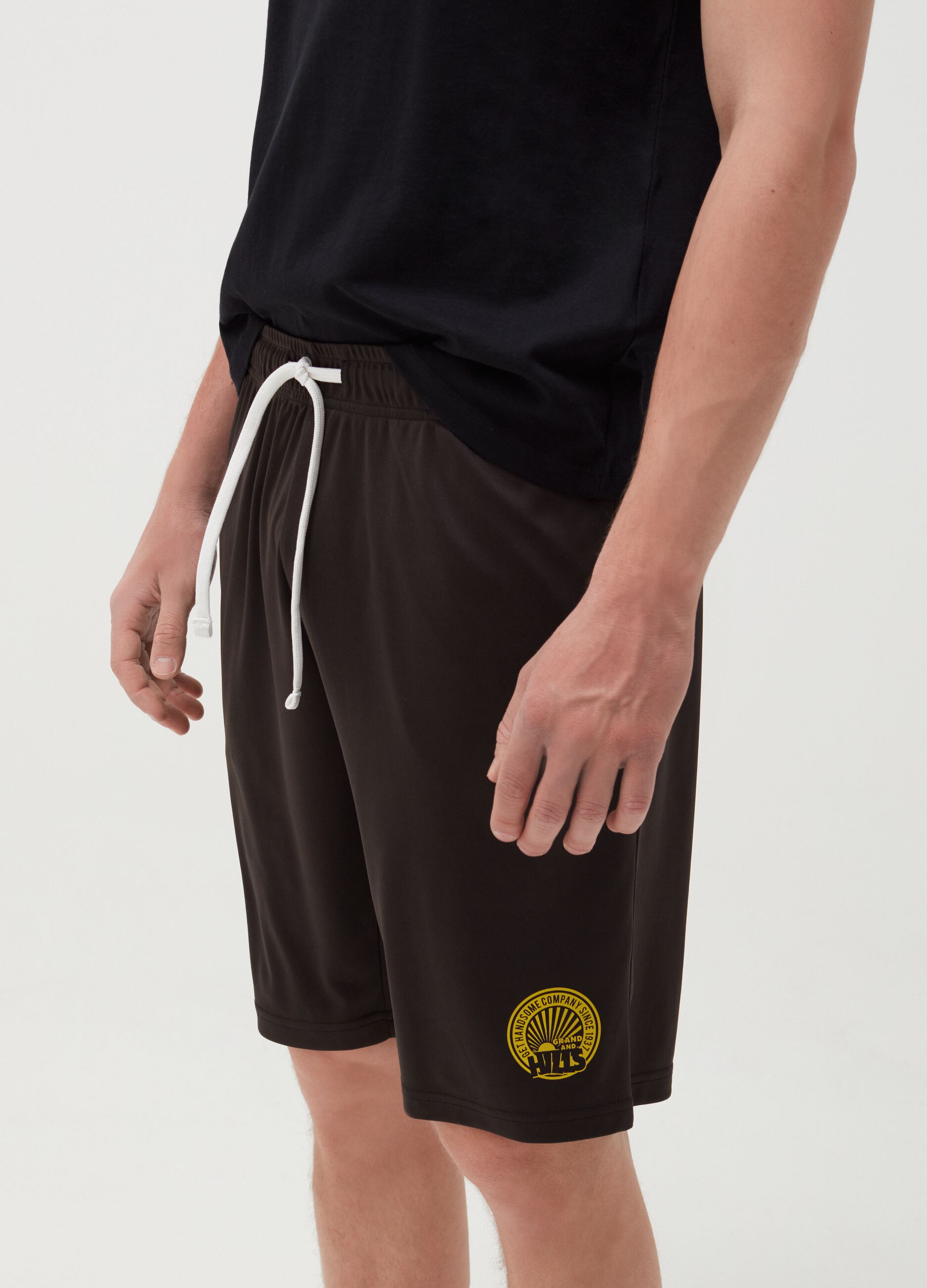 Bermuda shorts with drawstring and logo print