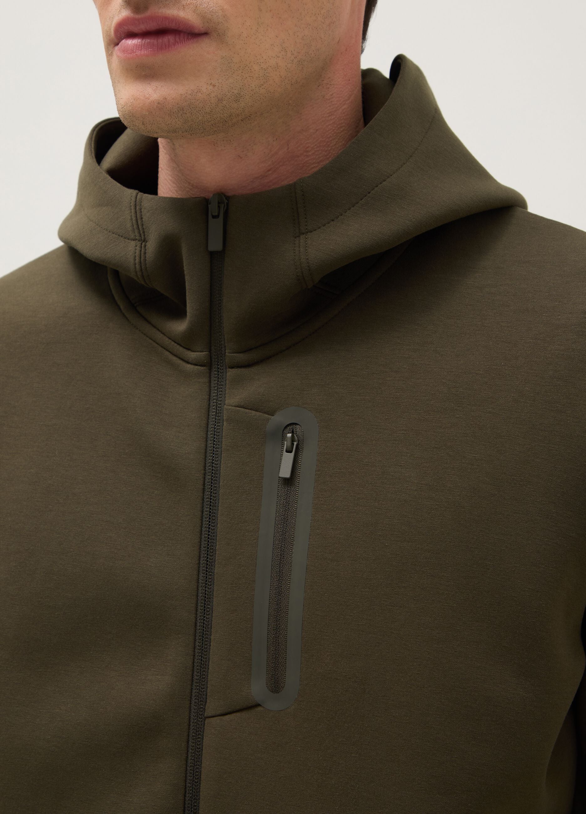 Regular fit green hoodie with front zip collar