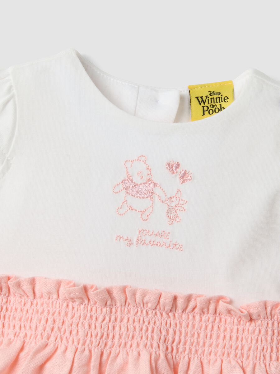 Pagliaccetto rosa in misto cotone e lino con ricamo Winnie The Pooh per neonata_2