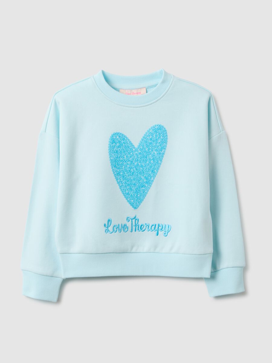Sky blue cotton blend regular fit sweatshirt with heart for girls_0