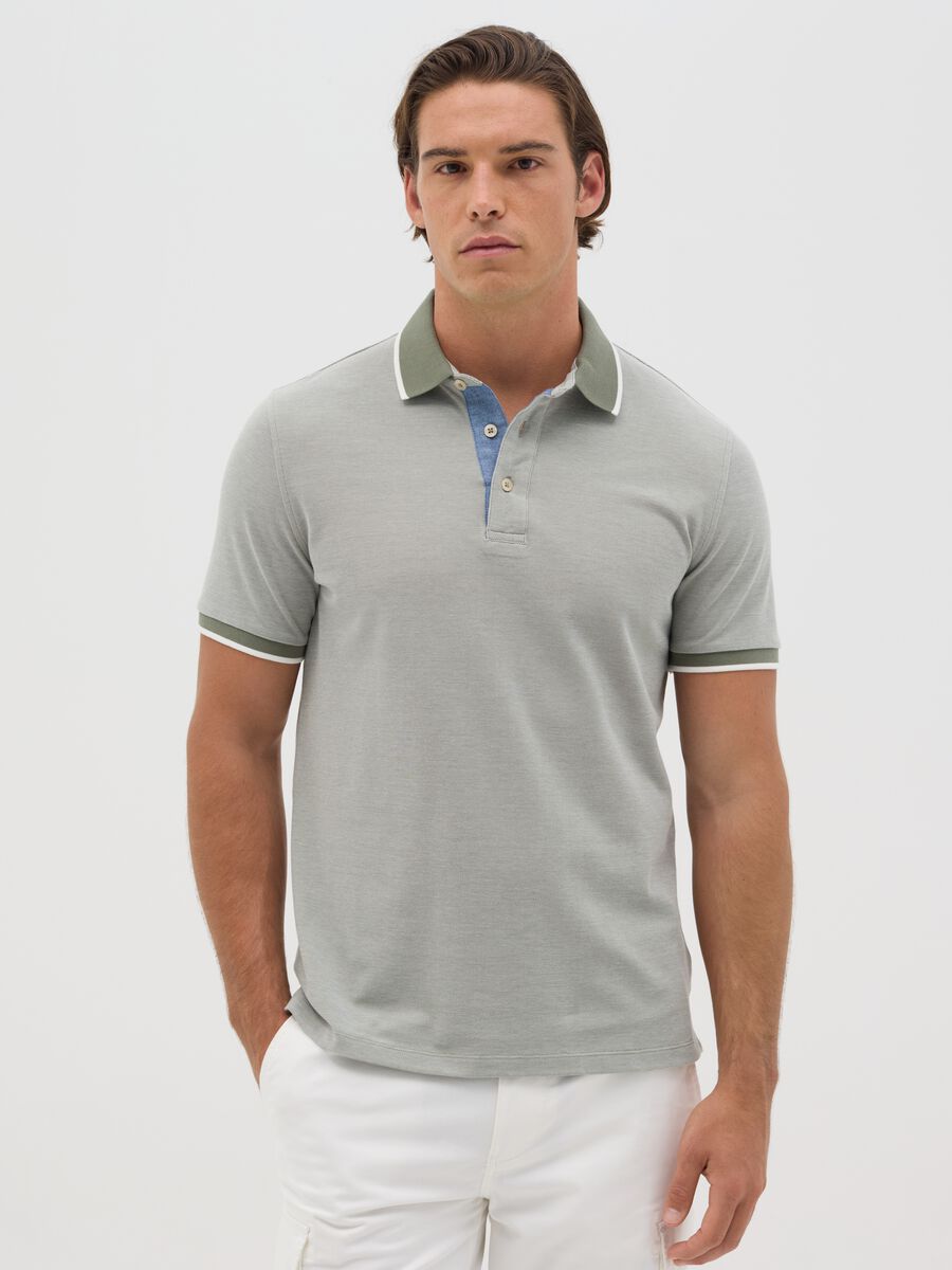 Green polo shirt with short sleeves in cotton piquet_0
