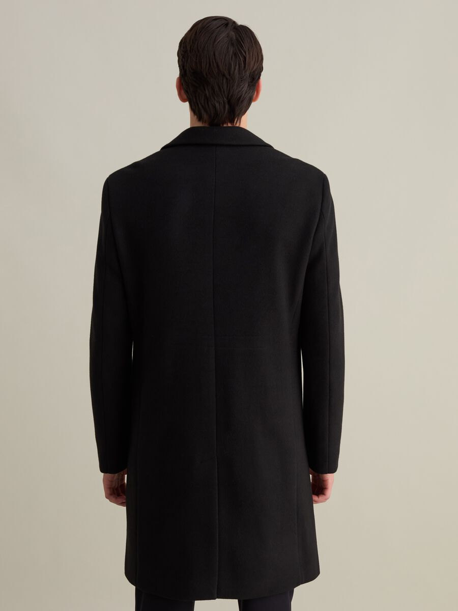 Long single-breasted solid colour coat_4