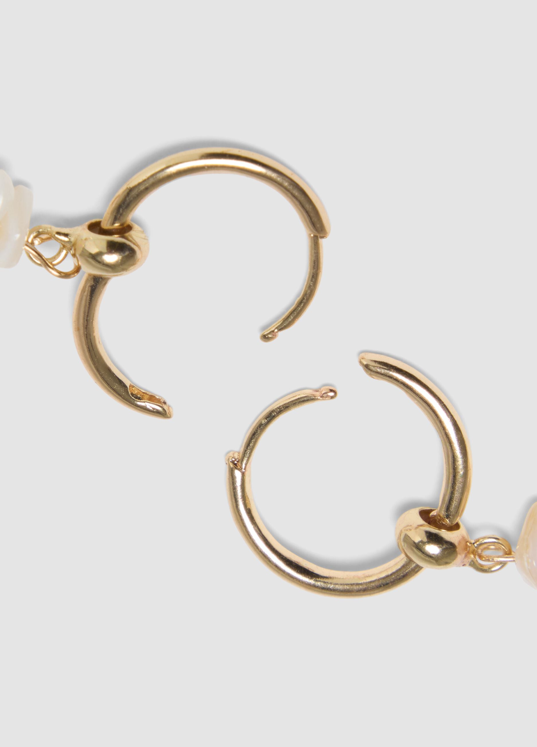 Gold-tone earrings with starfish charm