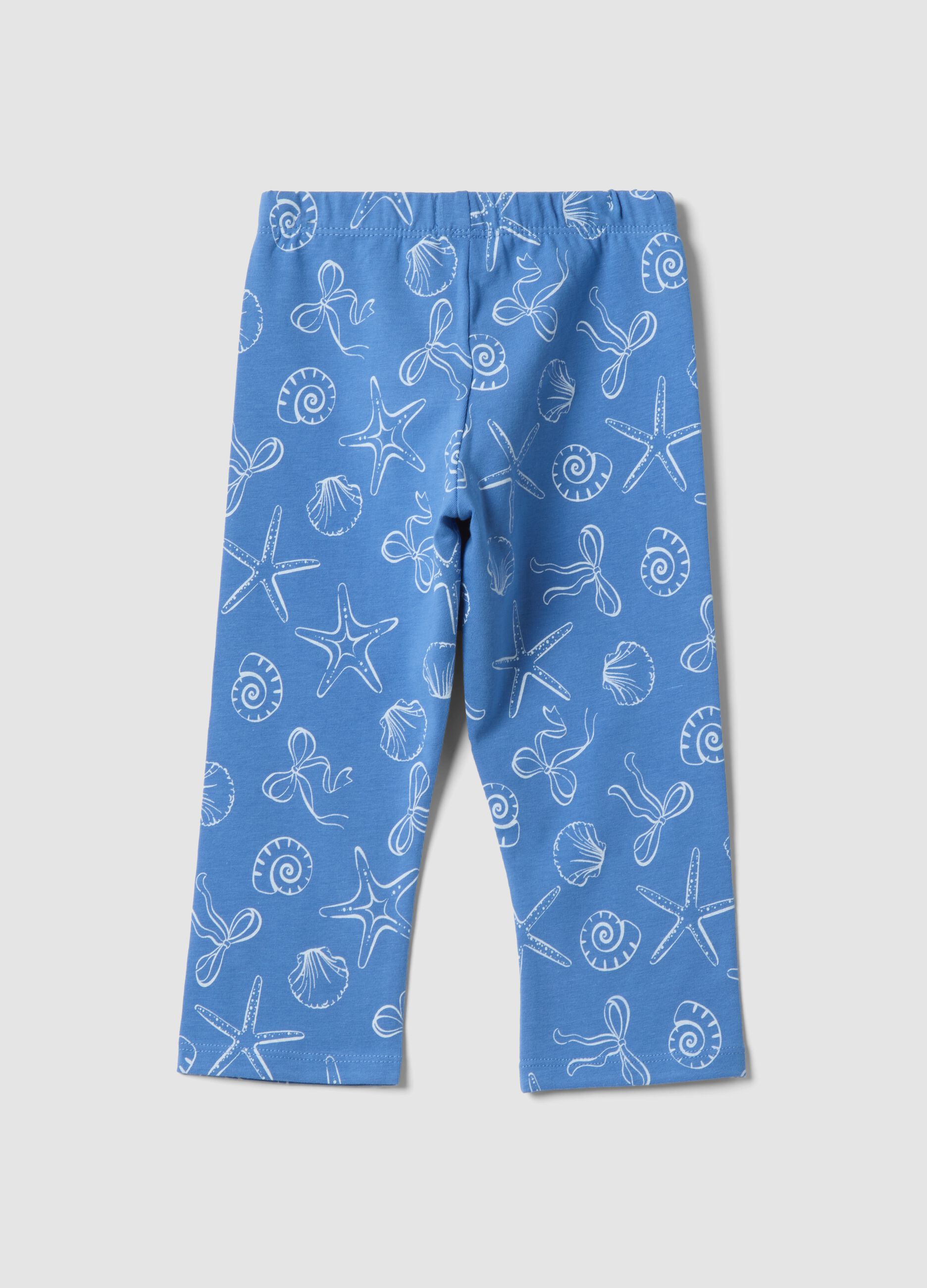 Girls&rsquo; skinny light blue stretch cotton leggings with prints