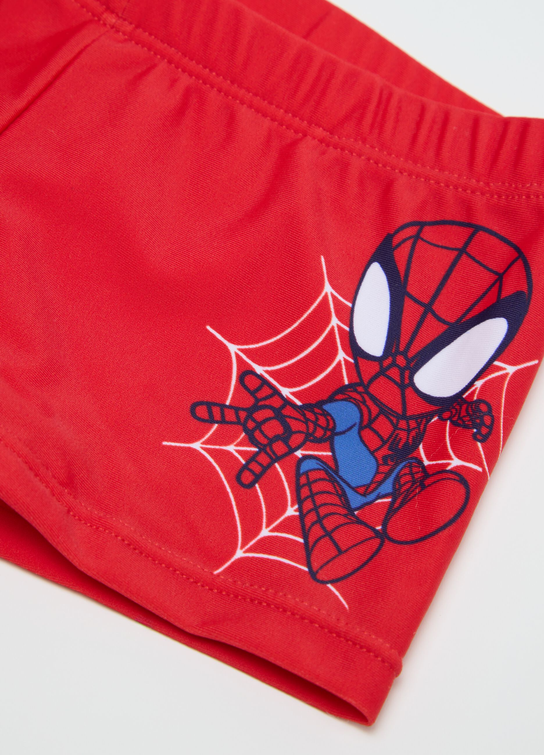 Boys’ swim briefs in red stretch fabric