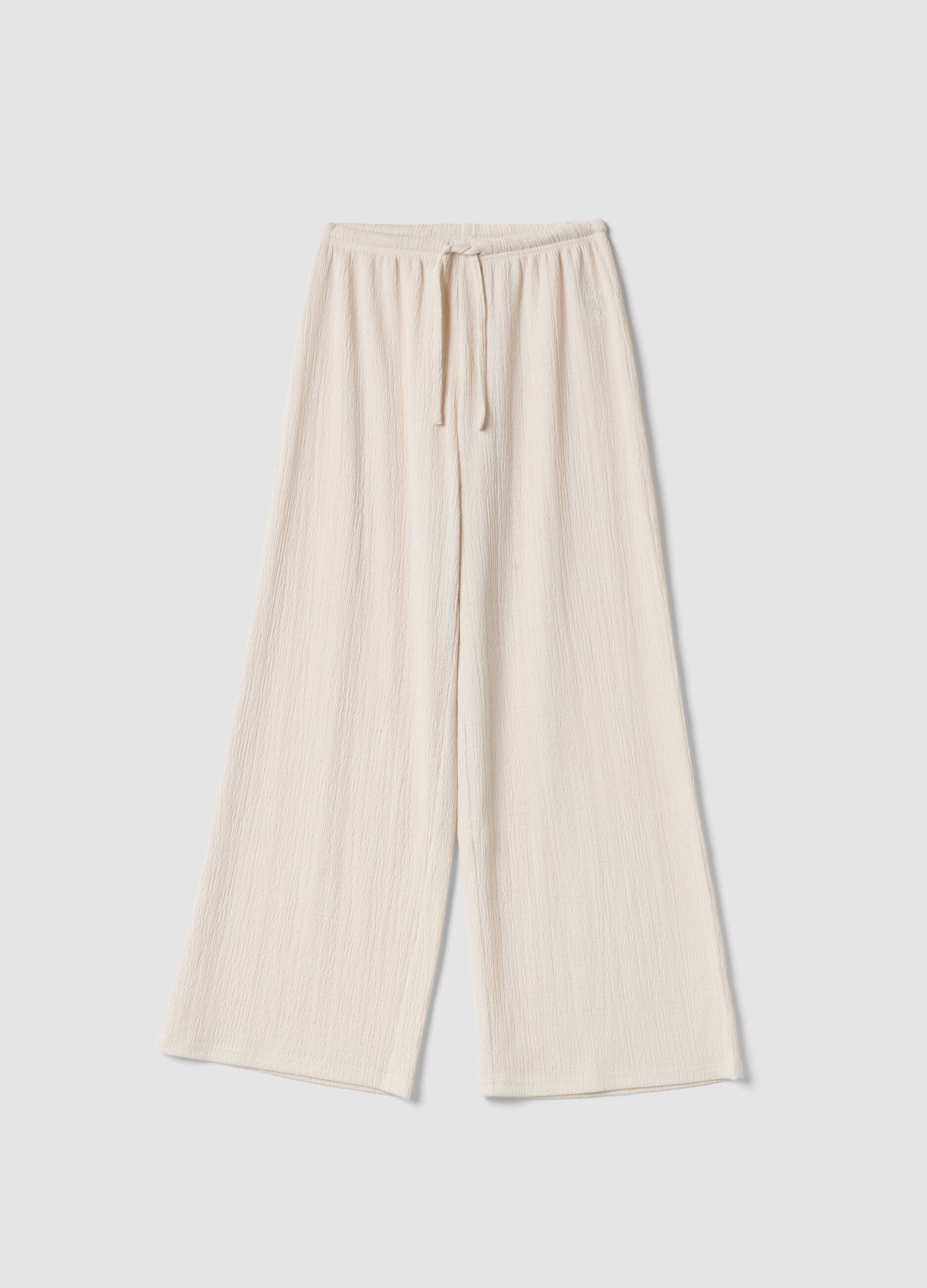 Beige wide leg jogger trousers