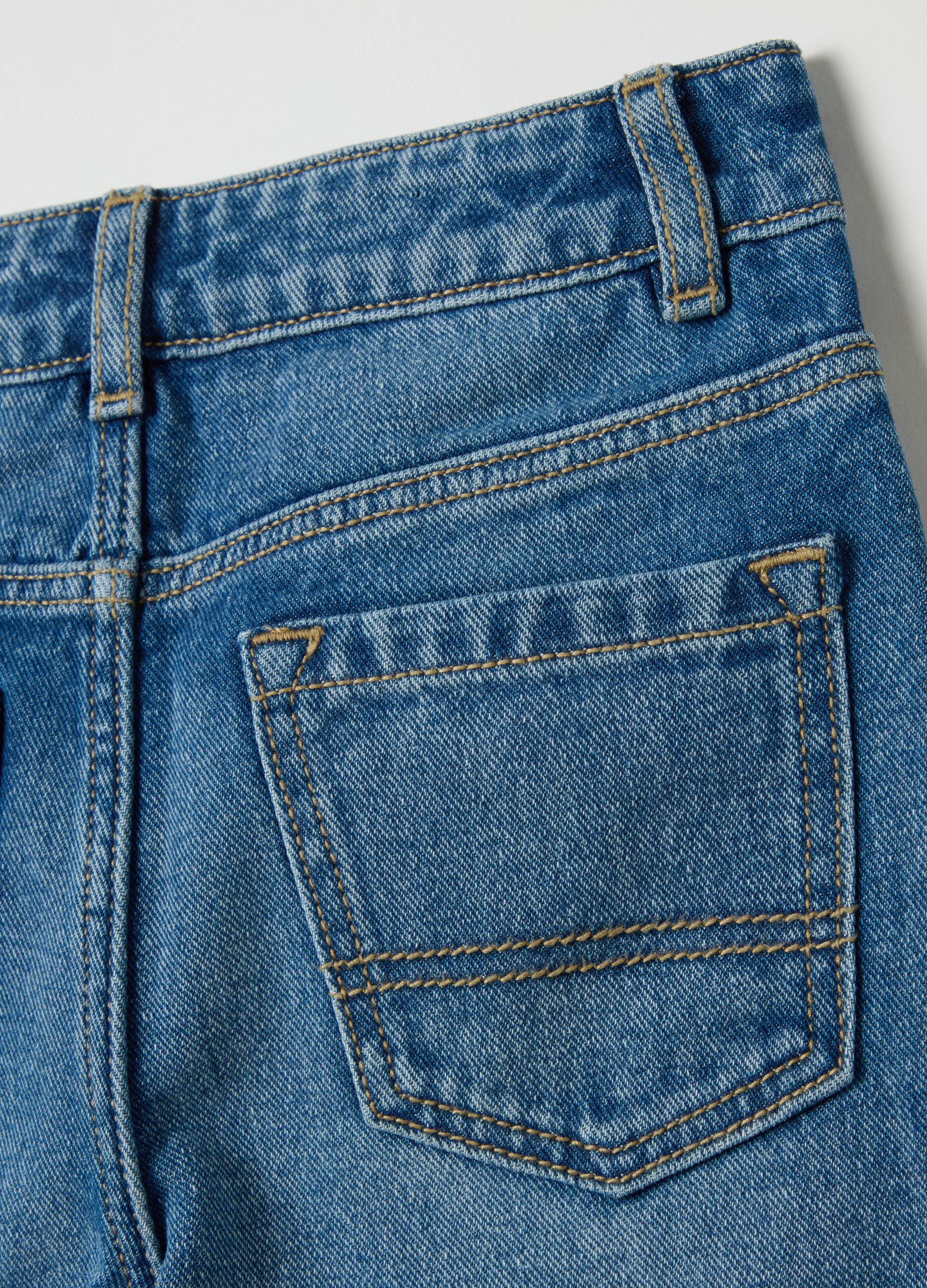 Culotte jeans with studs and abrasions