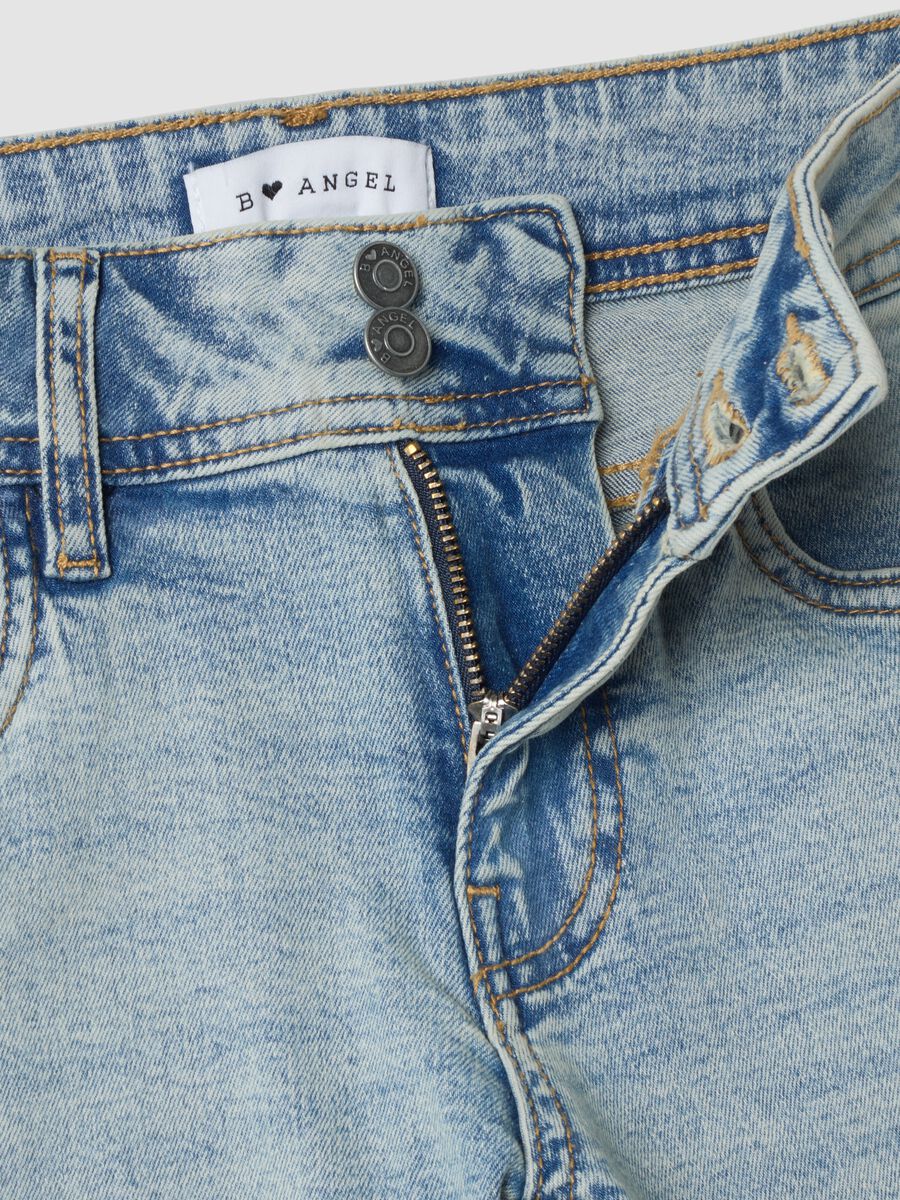Jeans blu chiaro flare in cotone elasticizzato_1