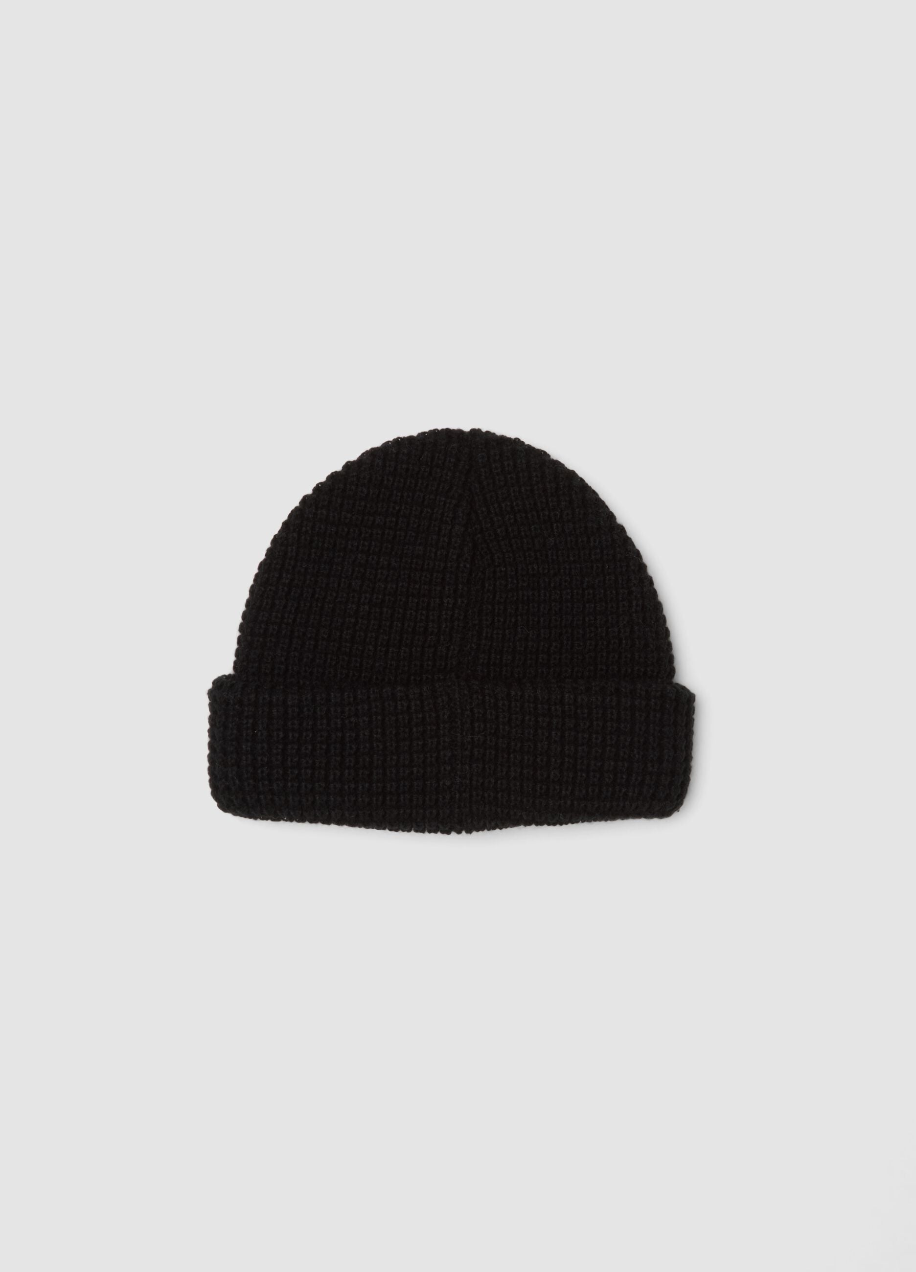 Black ribbed knit beanie with turn-up cuff