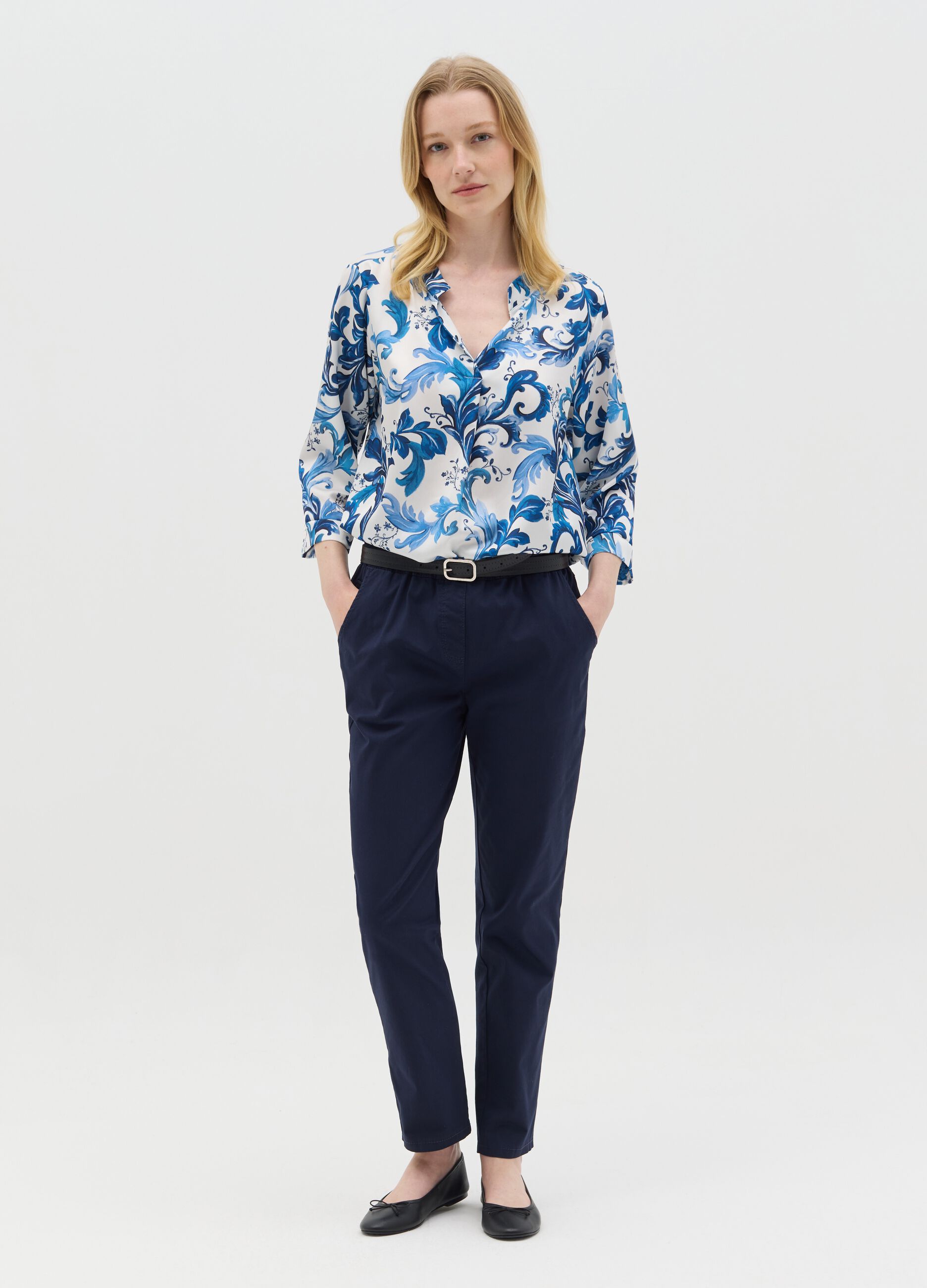 White and blue blouse with print